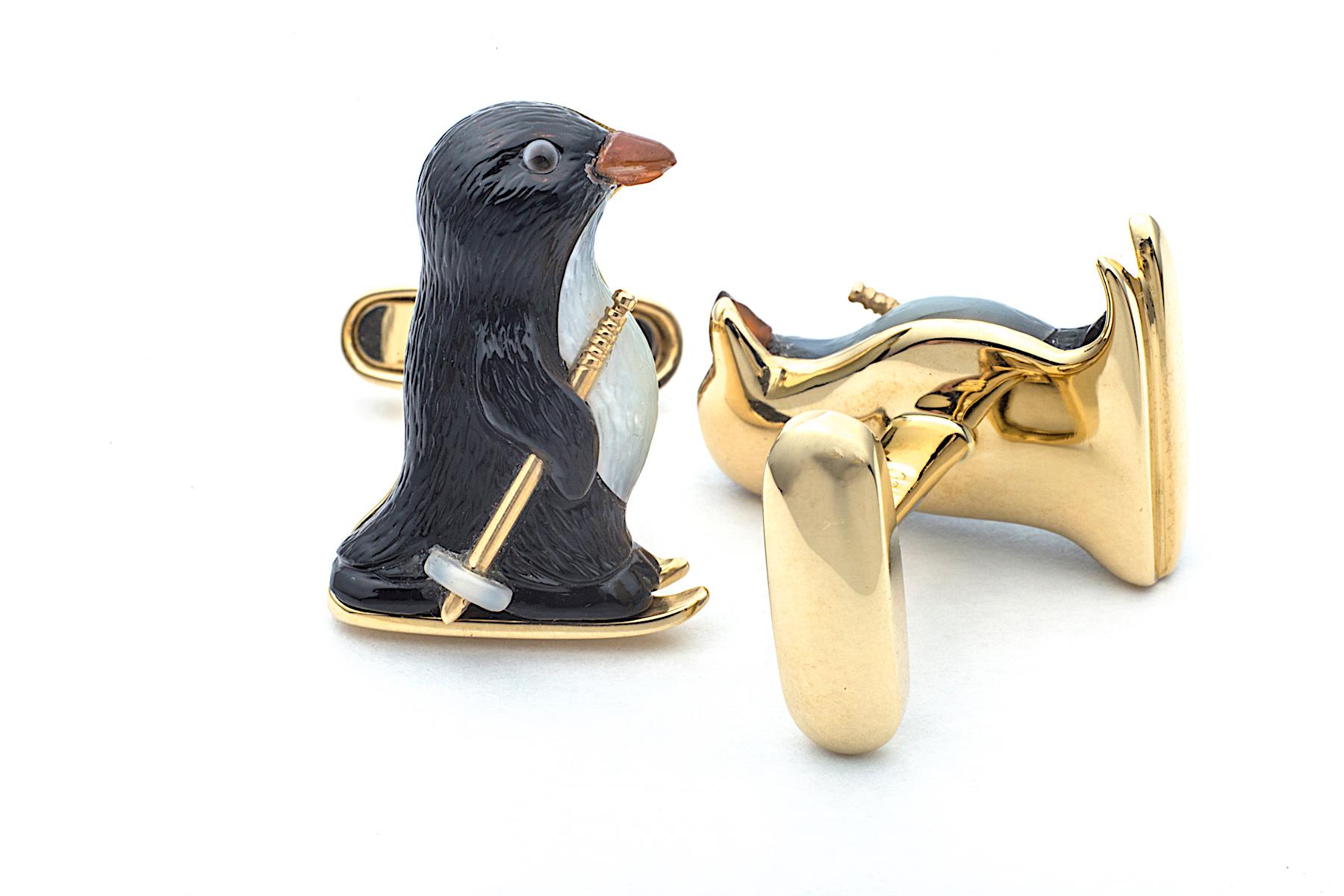 Contemporary Carved Onyx, Mother-of-Pearl, Carnelian and Gold Skiing Penguin Cufflinks