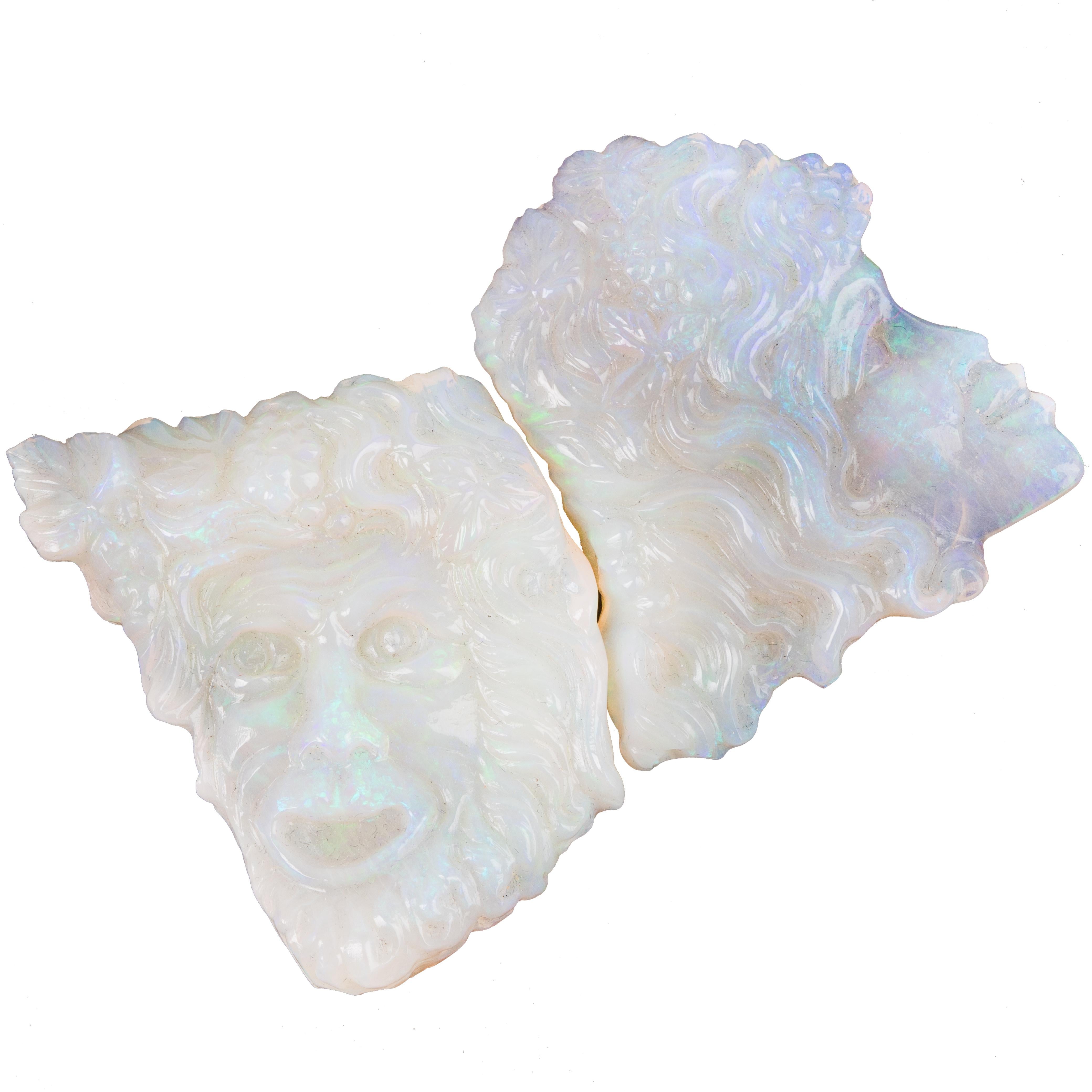 This pair of opal faces feature and man's face and a woman's face. This pair is very unique and is 94 carat tw. This pair comes in a case and is a wonderful collector's item. 
The opal stones are originally from Australia and carved in Europe.