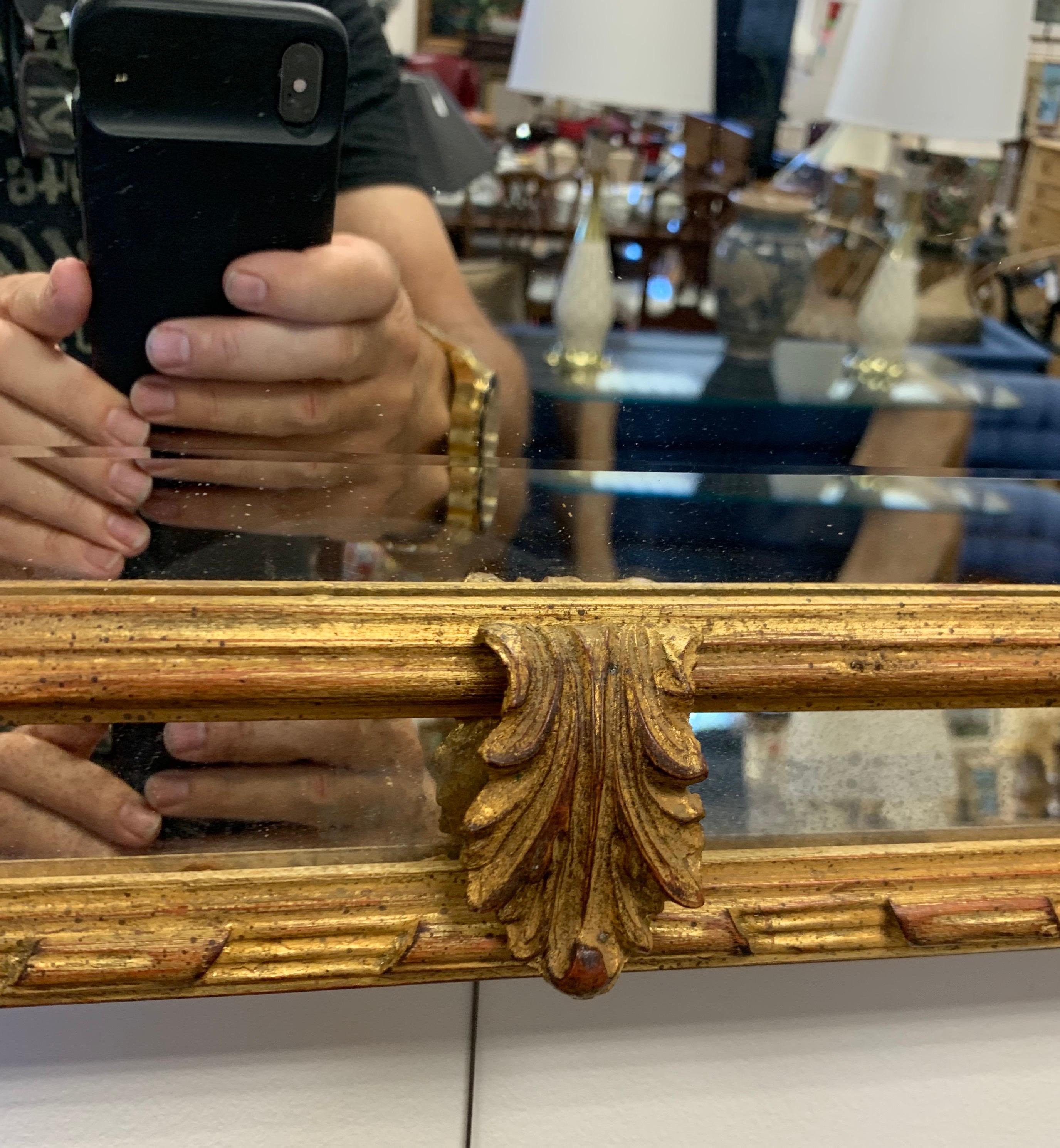 Carved Ornate Large Neoclassical Giltwood Wall Mirror In Good Condition In West Hartford, CT