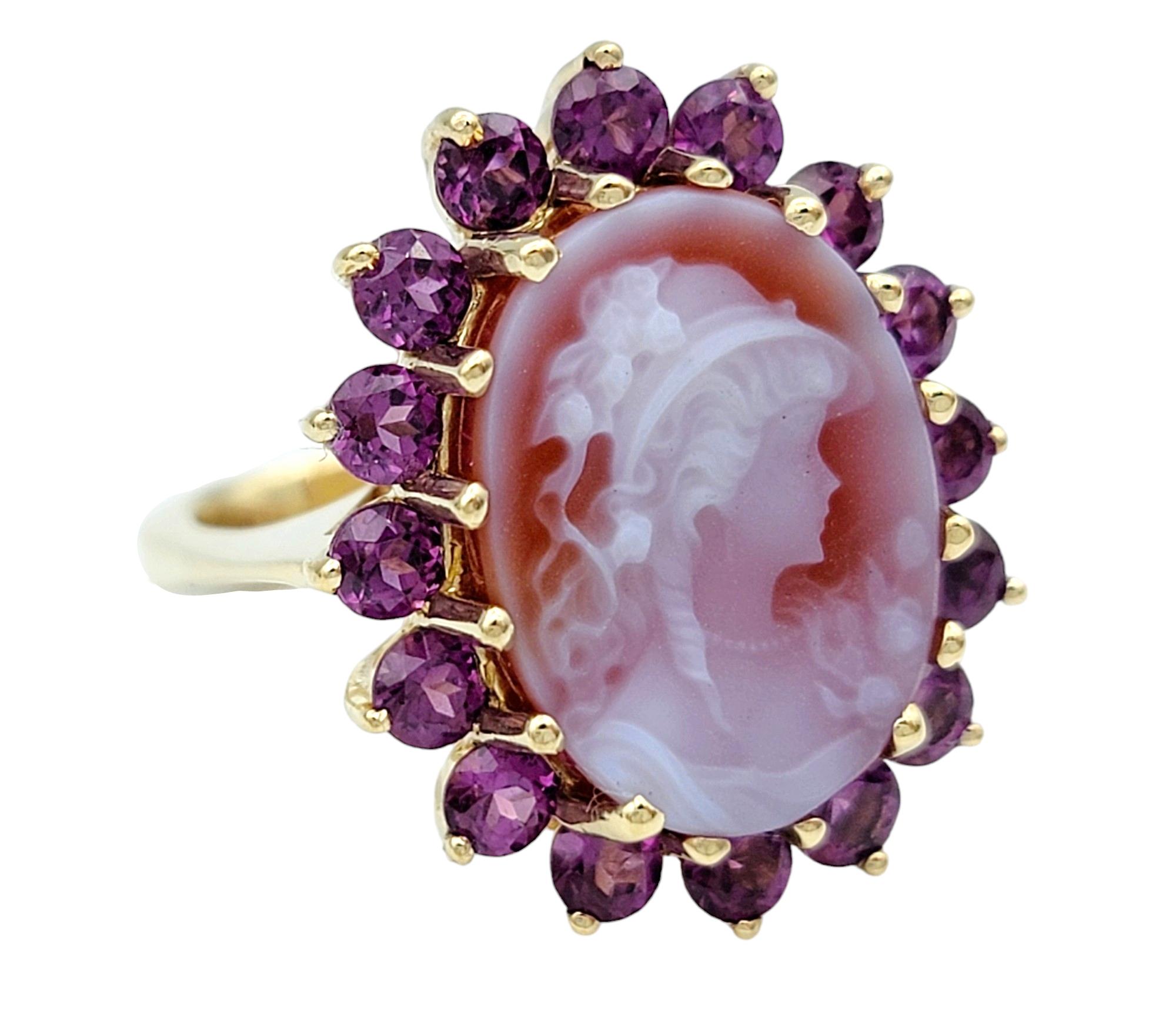 Contemporary Carved Oval Cameo and Pink Tourmaline Halo Ring Set in 14 Karat Yellow Gold For Sale