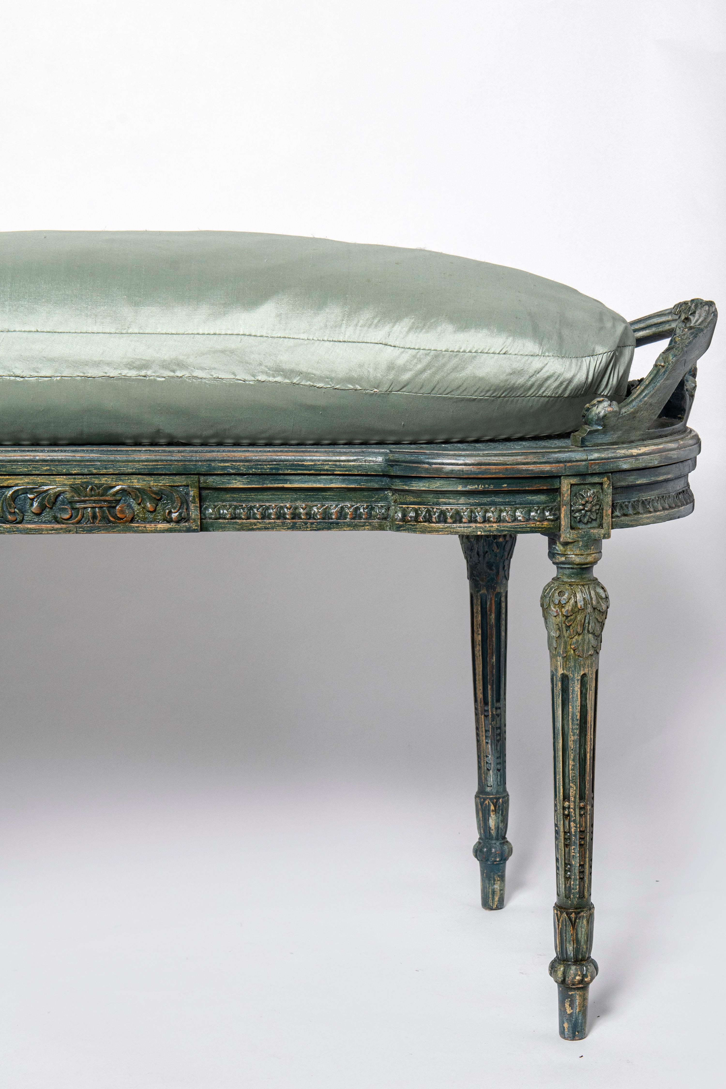 French Carved patinated wood and silk stool. France, late 19th century. For Sale