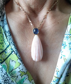 Carved Pear Shape Pink Opal Pendant With Blue Sapphire Cab Set In 14k Gold Bezel