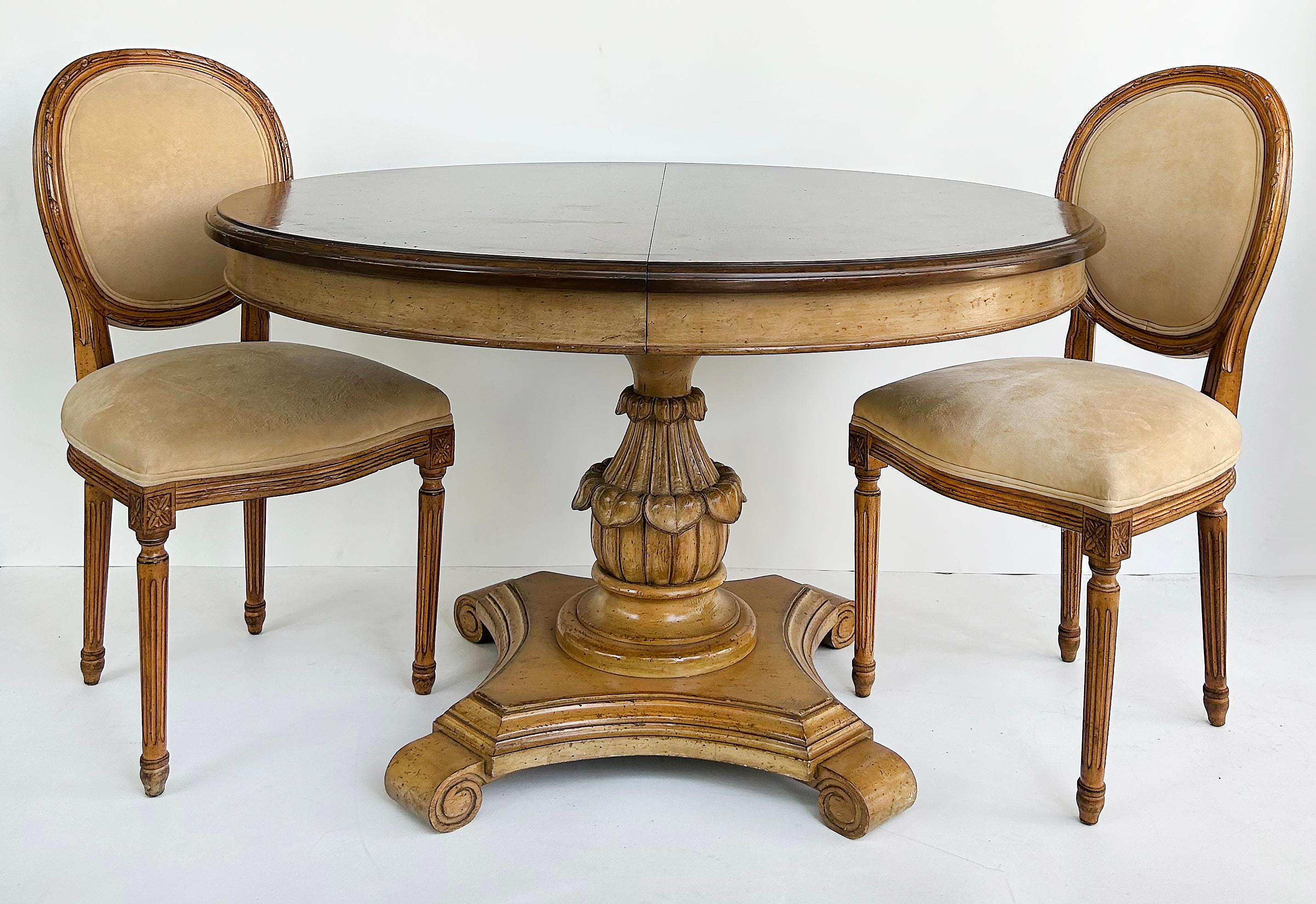 Carved Pedestal Dining Table, Extends Round to Oval with Two Leaves

Offered for sale is an elegant carved wood pedestal base dining room table with two leaves which extend the from round to oval.  The table has two additional supports that can be