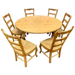 Carved Pine Farm Table and Six Matching Chairs Round Farmhouse Dining Set