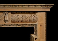 Carved Pine Fireplace with Lion's Mask and Drapery