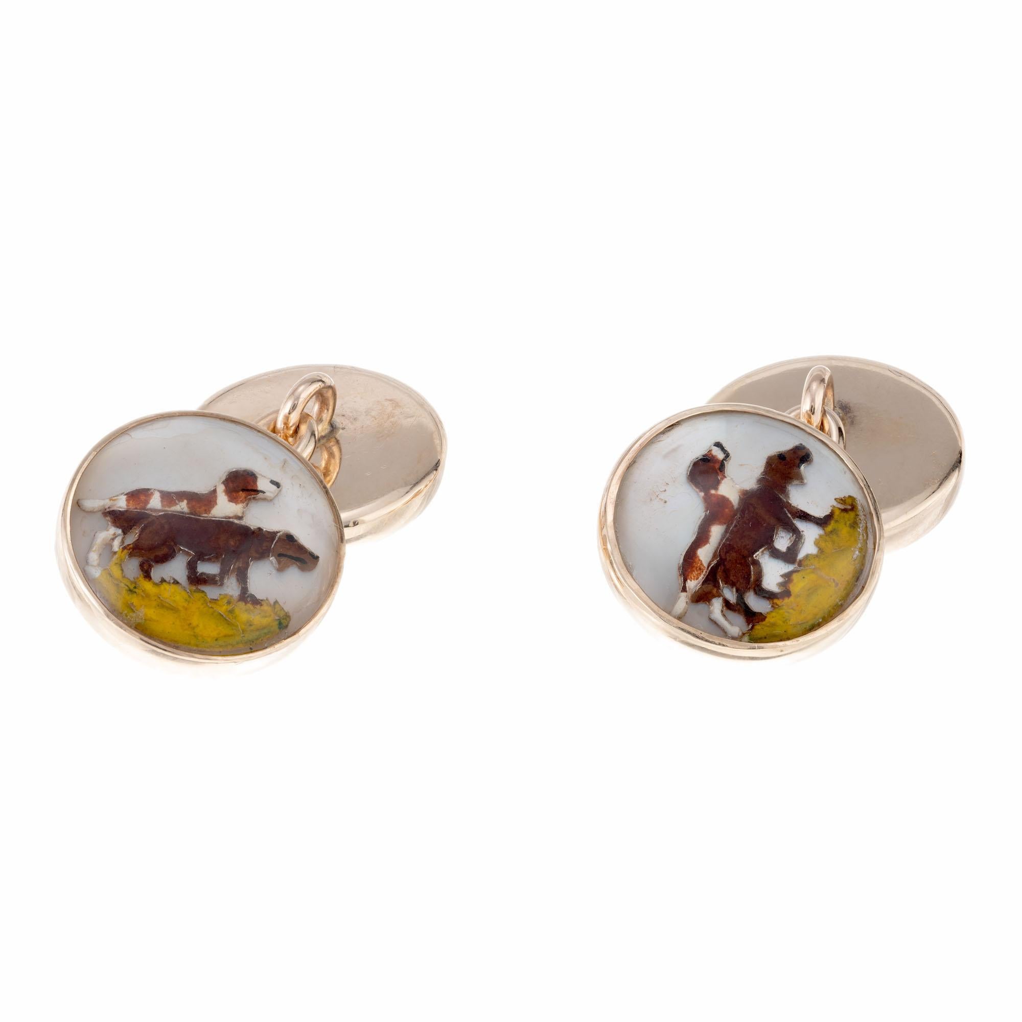 1940's Double sided pointer hunting dog cufflinks made of hand carved and painted quartz in 14k yellow gold.

4 cabochon round quartz
14k yellow gold 
Stamped: 14k
7.2 grams
Top to bottom: 25.7mm or 1 Inch
Width: 13.6mm or .5 Inch
Depth or