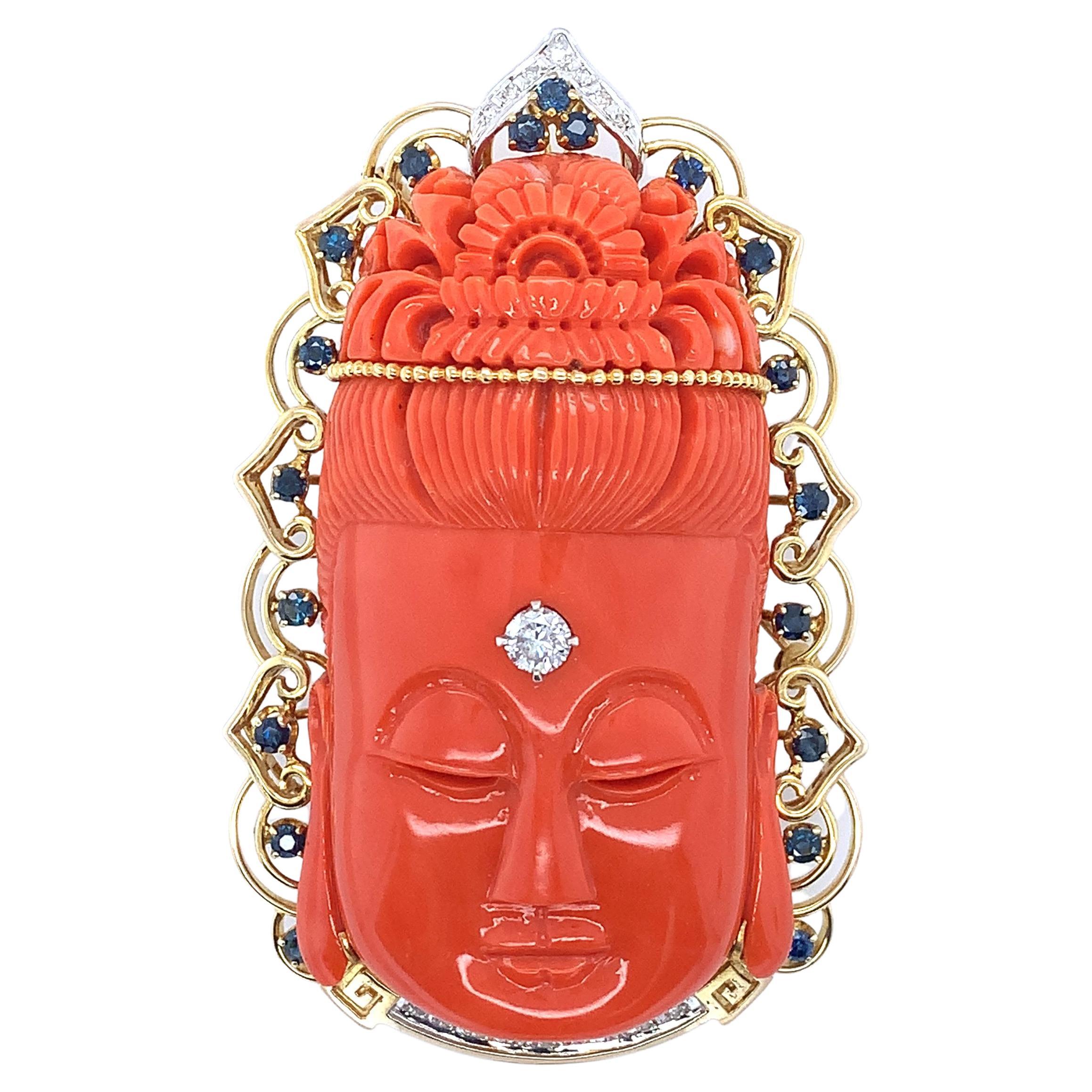 Broche pendentif Budhha en corail rouge sculpté, diamants et saphirs