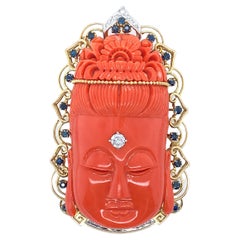 Carved Red Coral, Diamond, and Sapphire Budhha Pendant Brooch