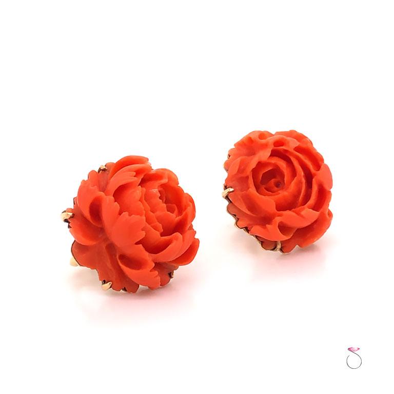 Stunning carved red coral flower earrings in 14k yellow gold. These magnificent earrrings features beautifully carved red coral flowers set in 5 prongs. The red coral flowers are masterfully carved into a flower with stunning details. each Flower