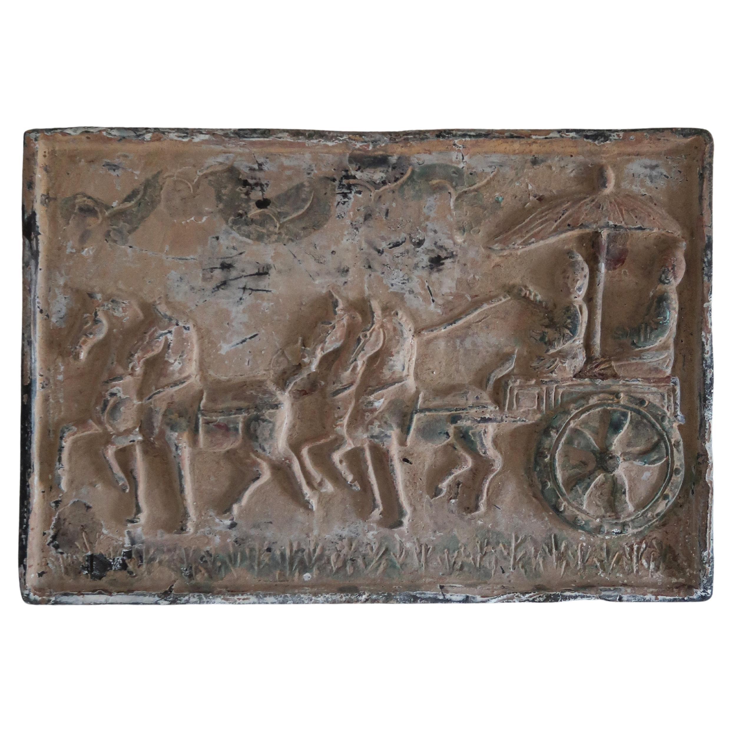 Targa in rilievo intagliata con scena di carrozza
