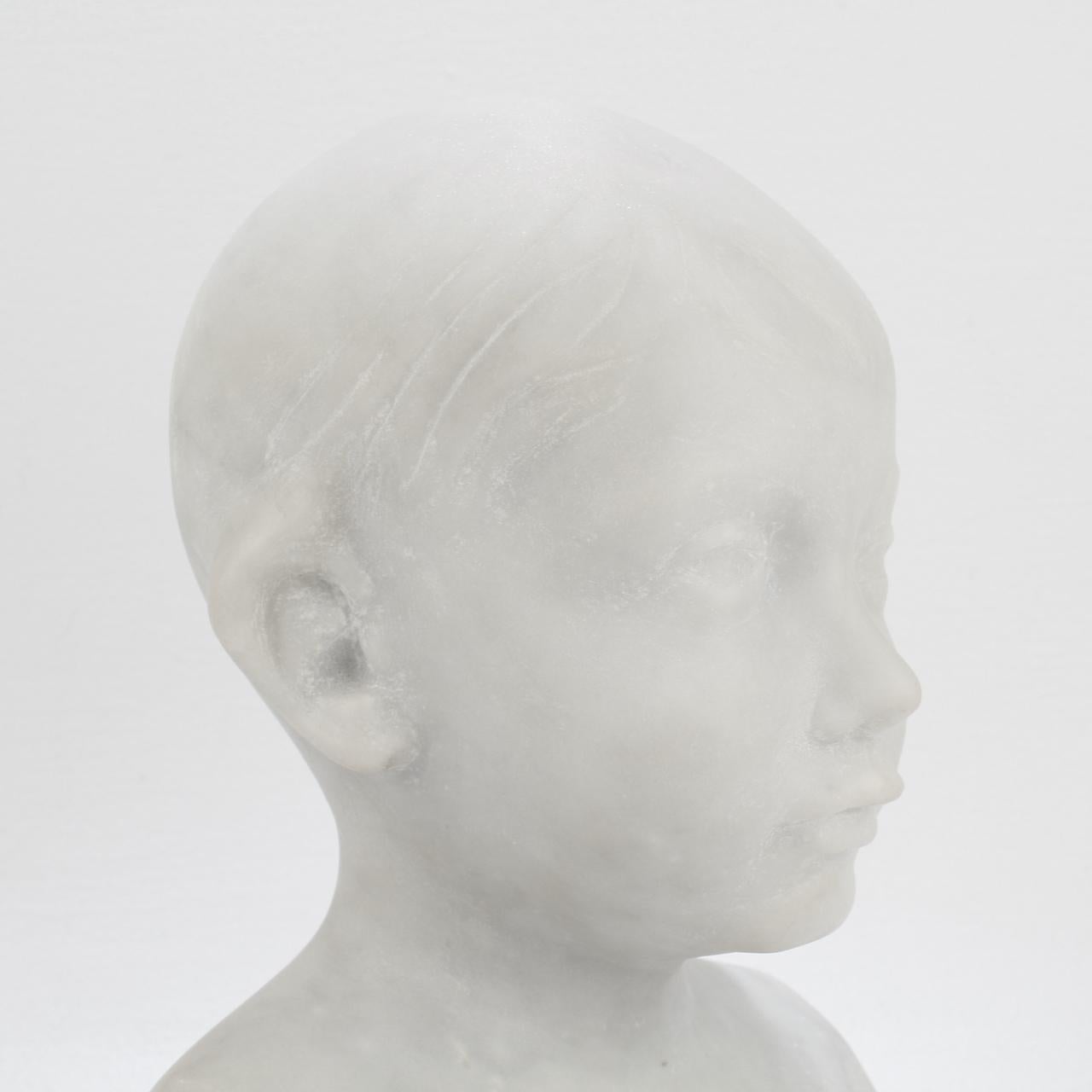 Carved Renaissance Style Cararra Marble Bust of a Child after Desiderio For Sale 5