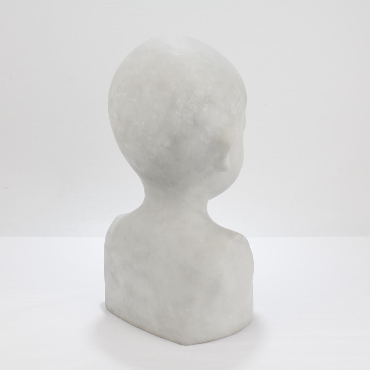 Carrara Marble Carved Renaissance Style Cararra Marble Bust of a Child after Desiderio For Sale
