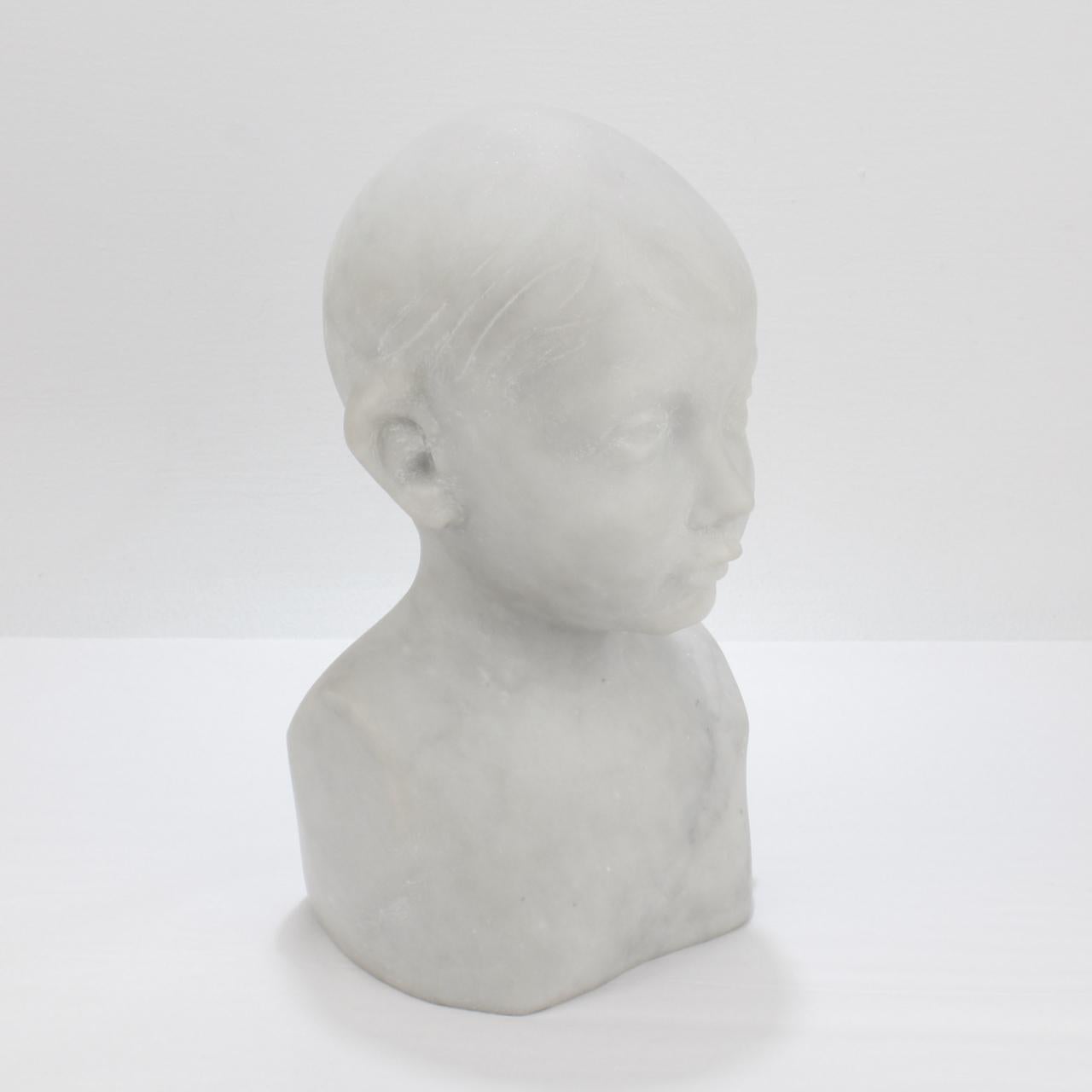 Carved Renaissance Style Cararra Marble Bust of a Child after Desiderio For Sale 3