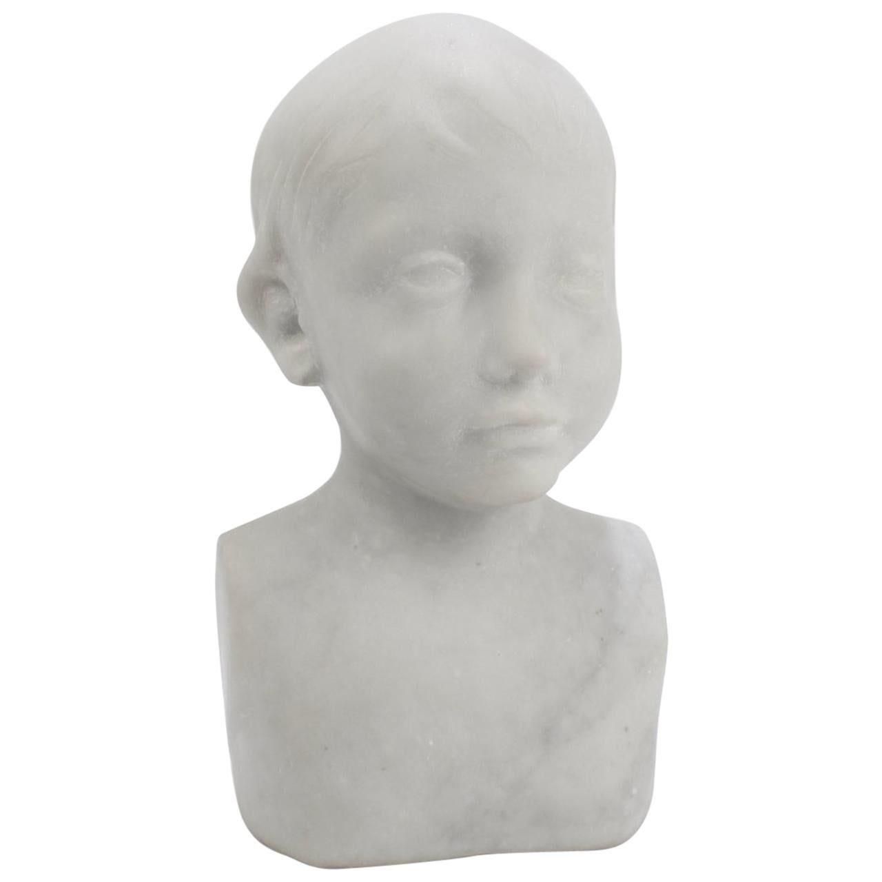 Buste d'enfant en marbre Cararra sculpté de style Renaissance d'après Desiderio