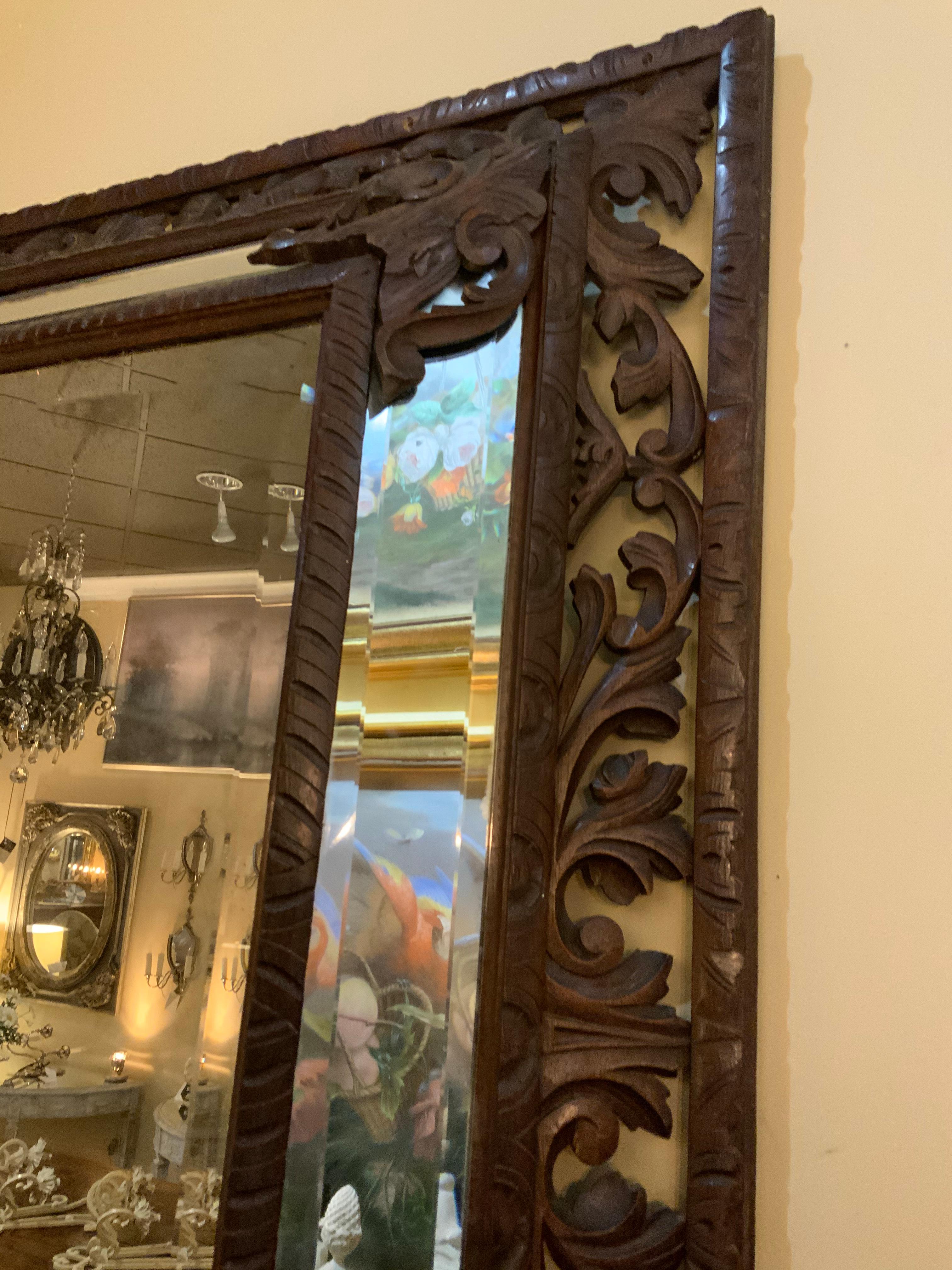 Well carved and beautifully beveled mirror found in Spain. Open reticulated carving makes this
Piece especially appealing. The interior mirror is projected and framed inset with a beveled mirror.