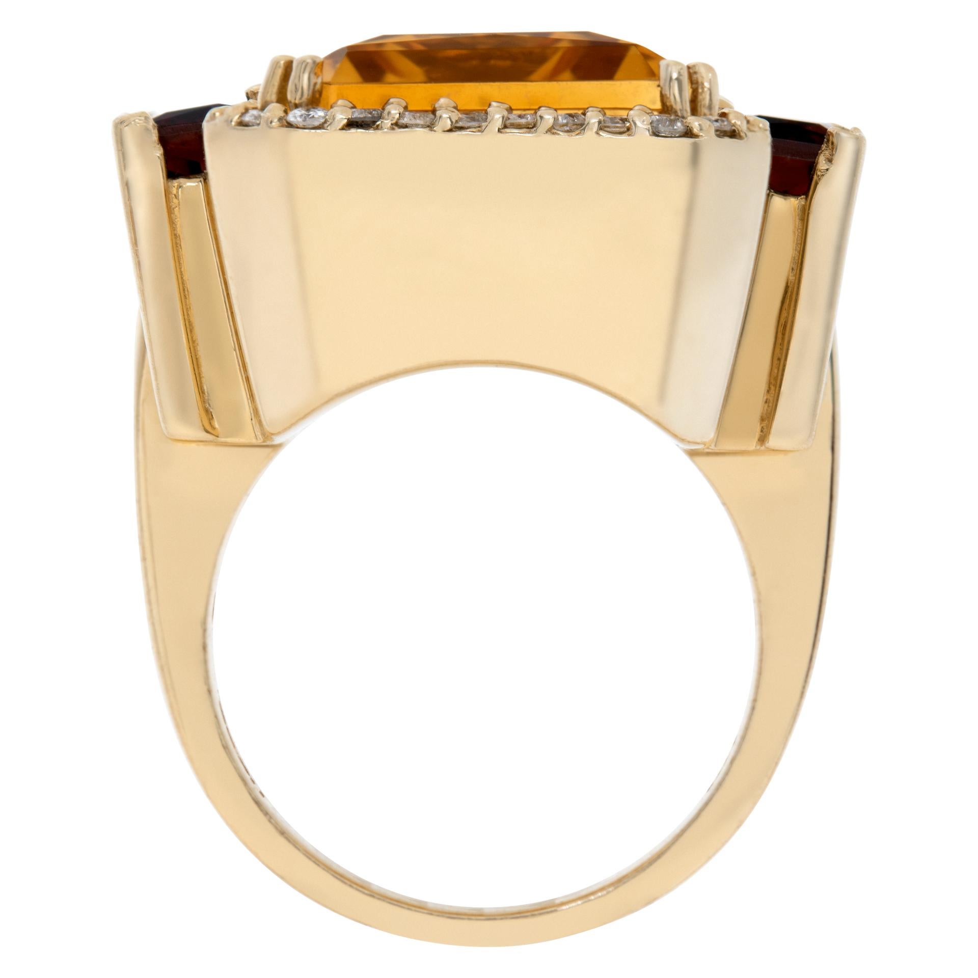 Women's or Men's Carved ring in yellow gold with citrine, deep red garnet, and accent diamonds. For Sale
