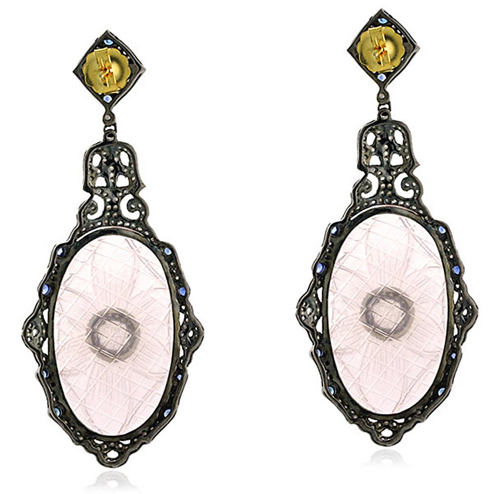 This too cool for summer Carved Rose Quartz Earring with Diamonds and Blue Sapphire in gold and silver will be the prettiest earring you have seen lately.

Closure: Push Post

18Kt: 1.67g
Diamond: 2.92Ct
Silver: 18.16g
BLUE SAPPHIRE: 3.8Ct
ROSE