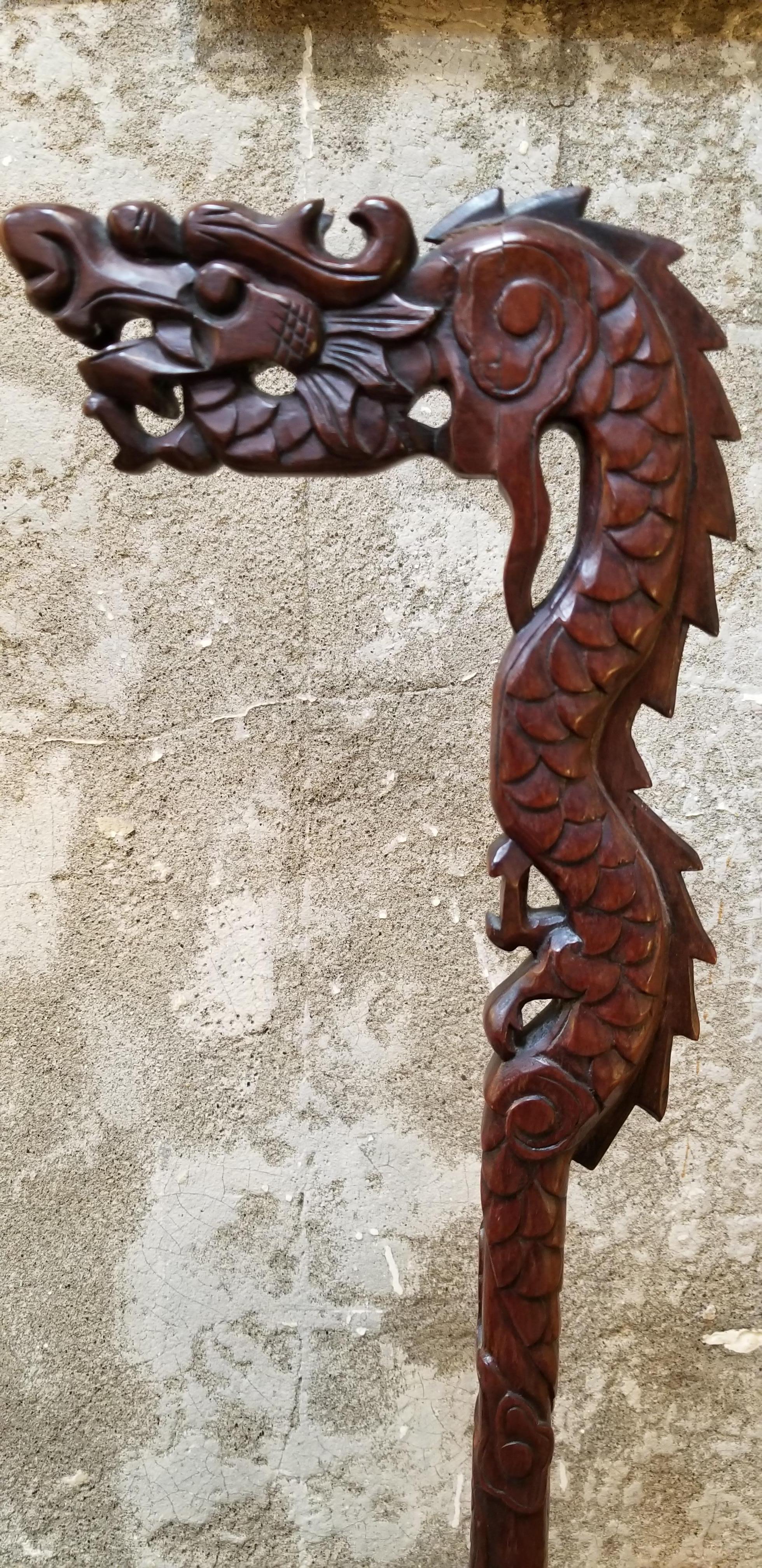 Hand carved rosewood dragon lantern or lamp base. Chinese Republic, circa 1920s. Beautiful patina to original finish. Could be displayed as a wood sculpture or a shade added for accent lighting. No shade.