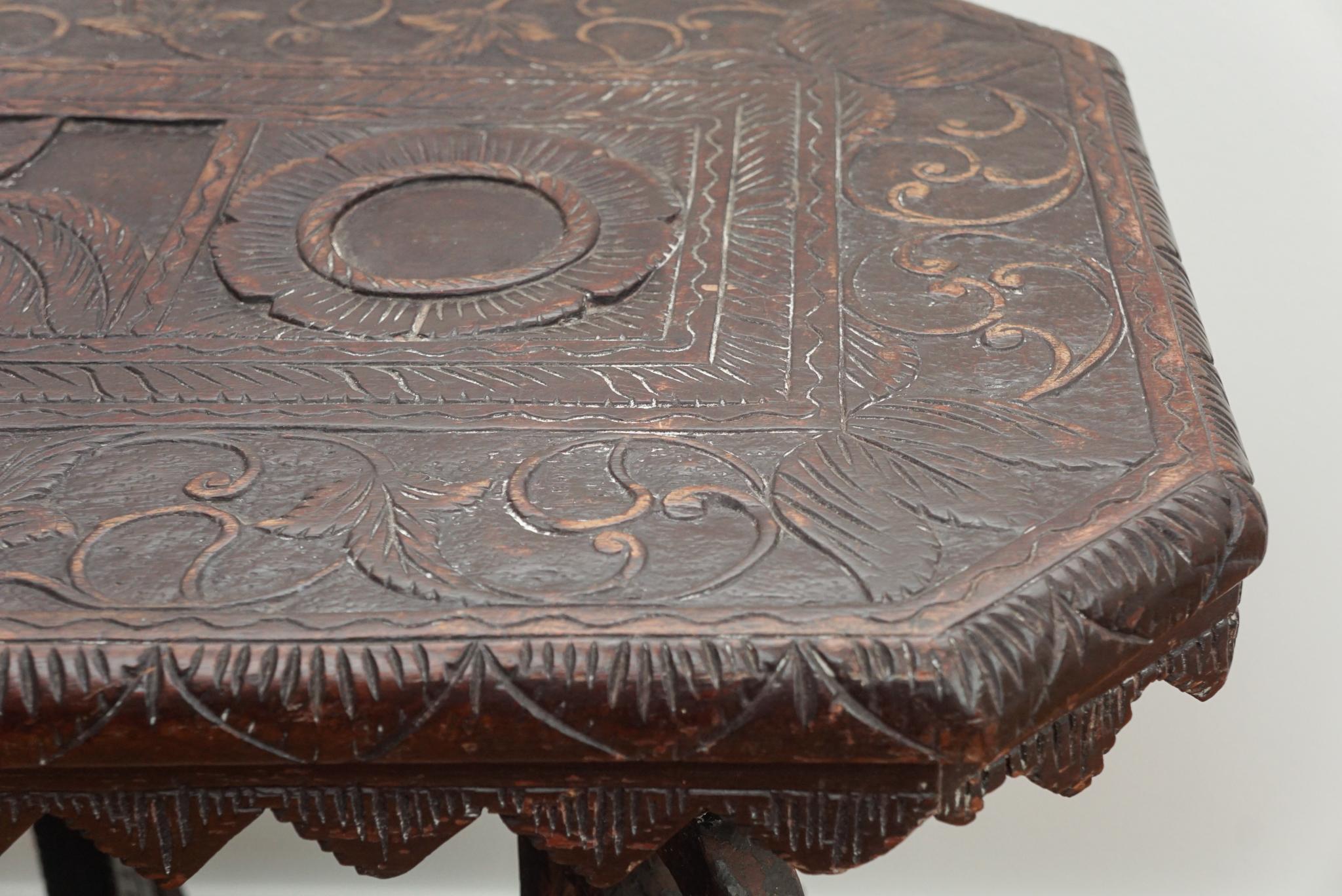 Carved Rosewood Yala Table In Good Condition In Hudson, NY