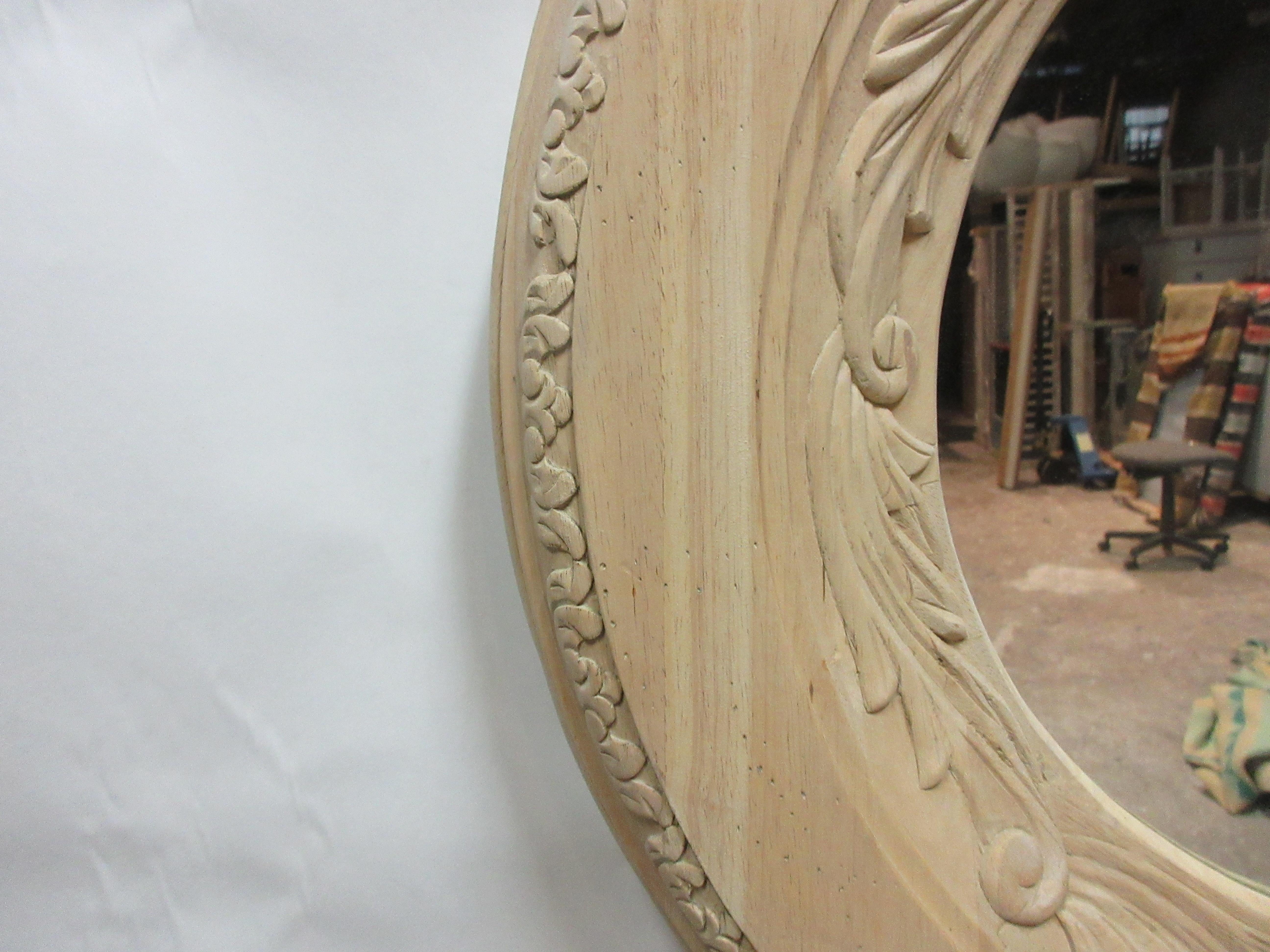 This is an unusual round hand carved wall mirror. I purchased it with a Dark Brown wood stain and decided it would look much better stripped to raw wood.