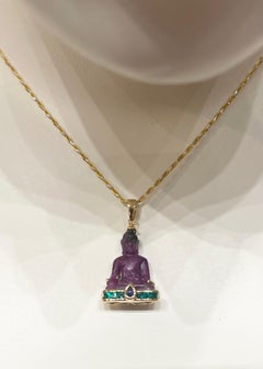Carved Ruby, Cabochon Blue Sapphire and Emerald Buddha Pendant set in 18K Gold