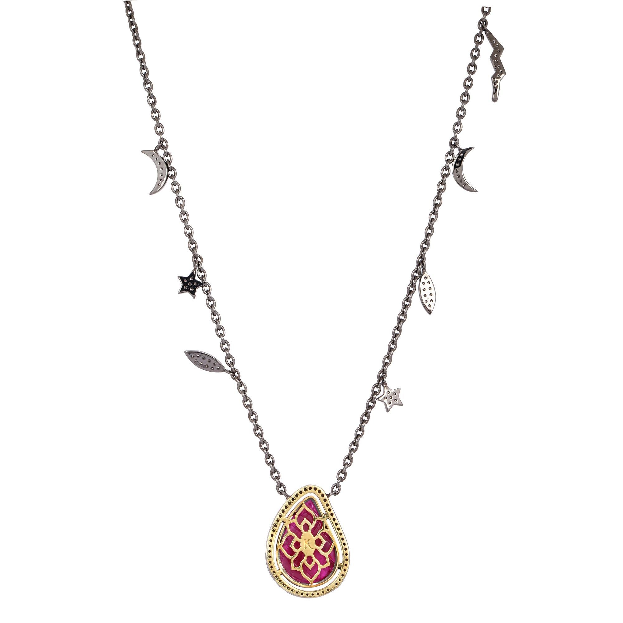 This necklace is crafted in 18-karat gold and sterling silver. It is hand set in 7.01 carats carved ruby and .66 carats of diamonds. Chain length-18 inch.

FOLLOW  MEGHNA JEWELS storefront to view the latest collection & exclusive pieces.  Meghna