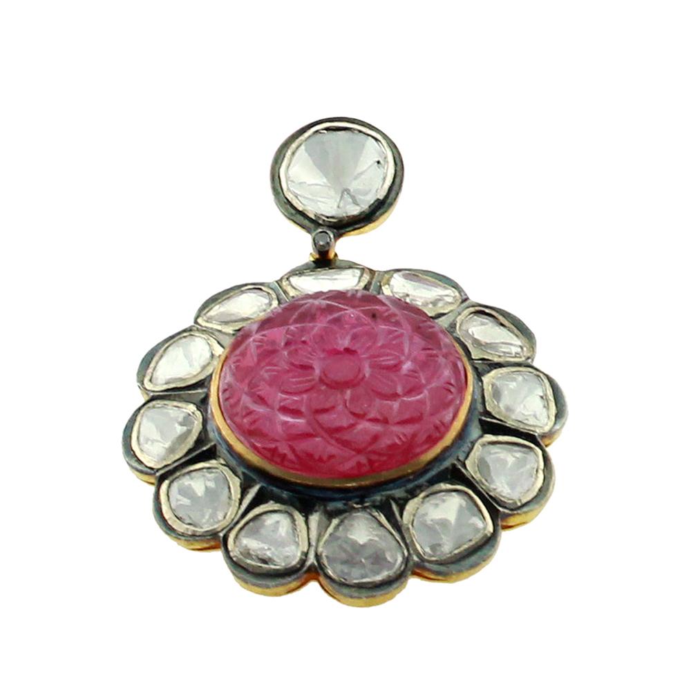 Lovely round floral carved ruby pendant with polki diamonds around making a beautiful flower shape.


14k: 3.55g
Diamond: 2.48ct
Ruby: 13.12cts