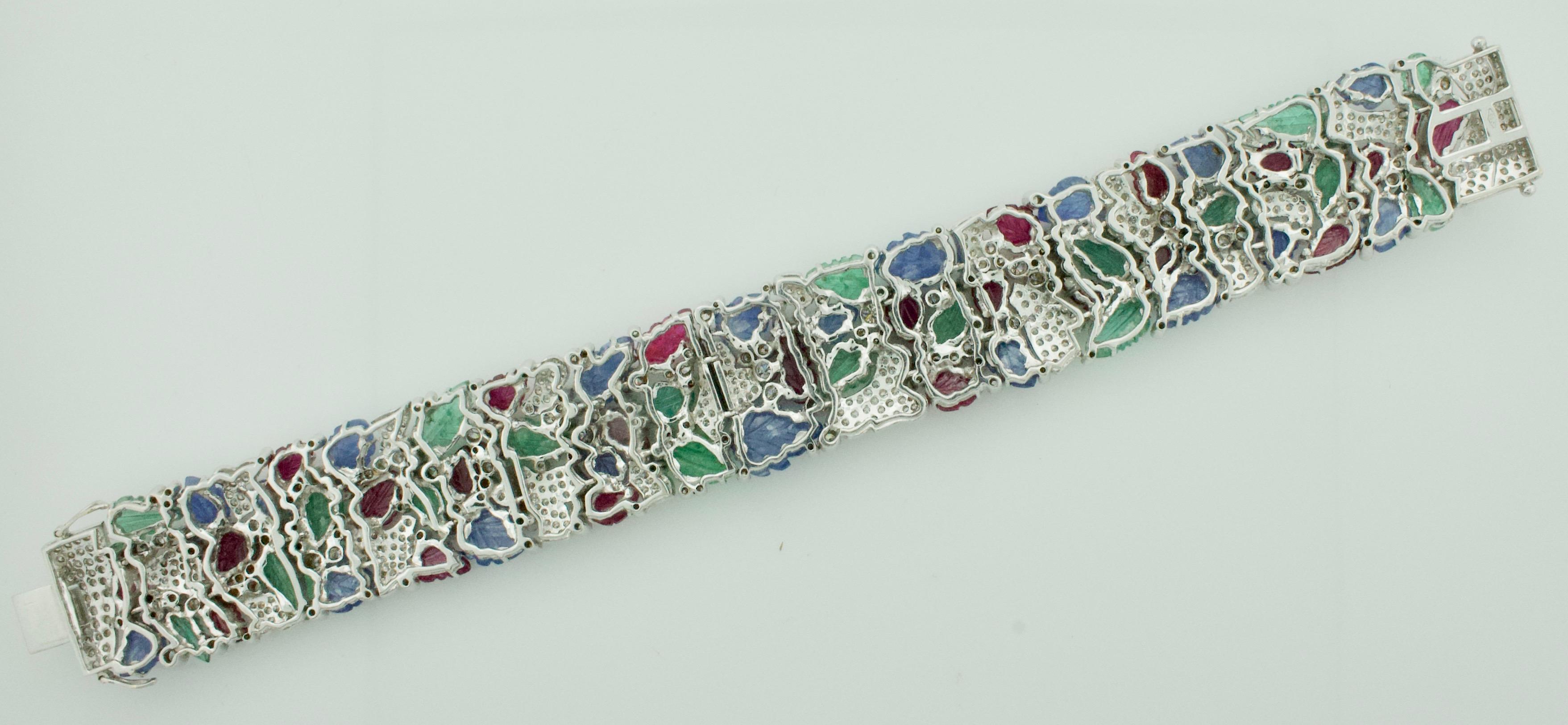 Modern Carved Ruby, Sapphire, Emerald and Diamond “Tutti Frutti” Bracelet in 18 Karat