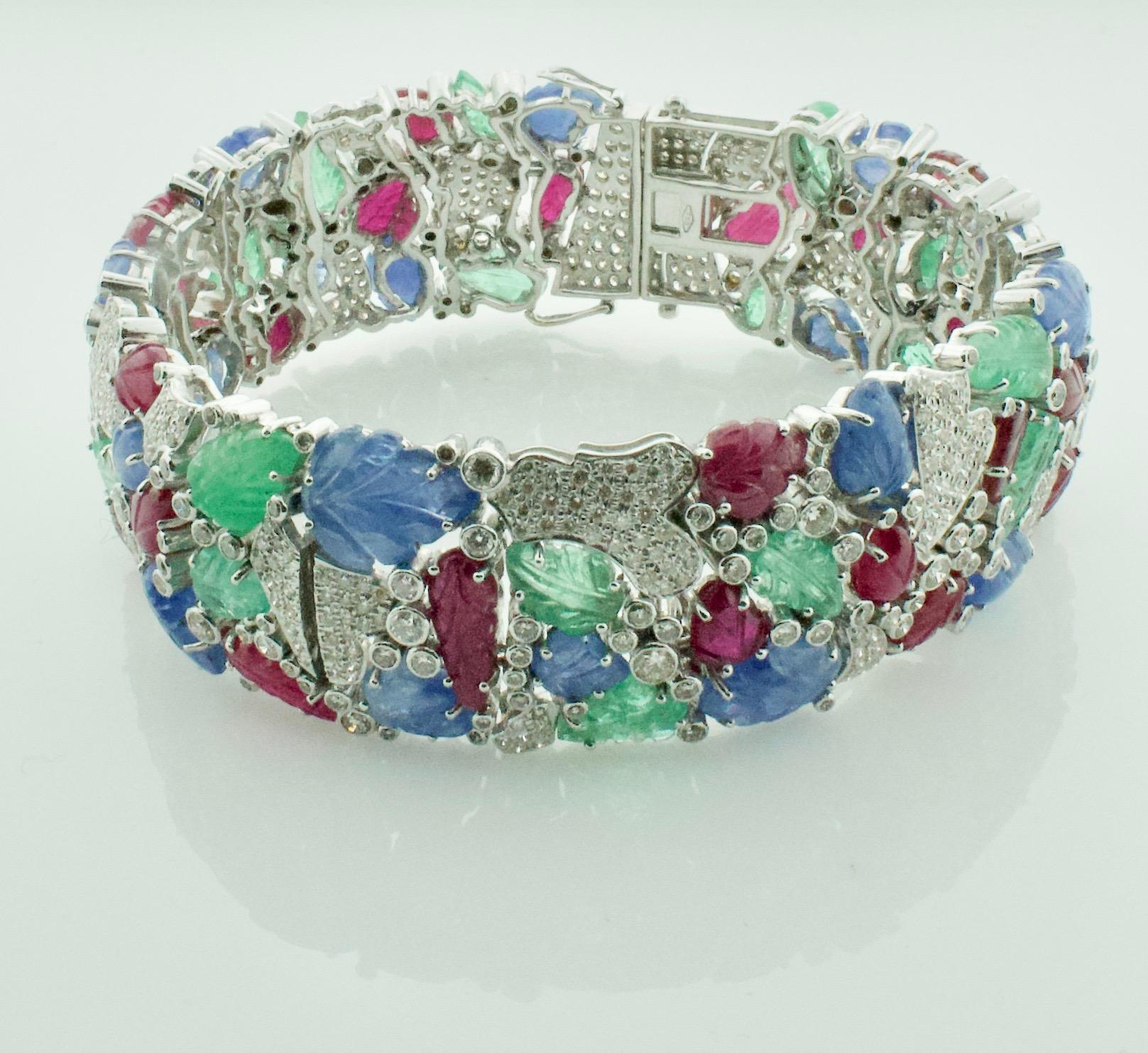 Carved Ruby, Sapphire, Emerald and Diamond “Tutti Frutti” Bracelet in 18 Karat In New Condition In Wailea, HI