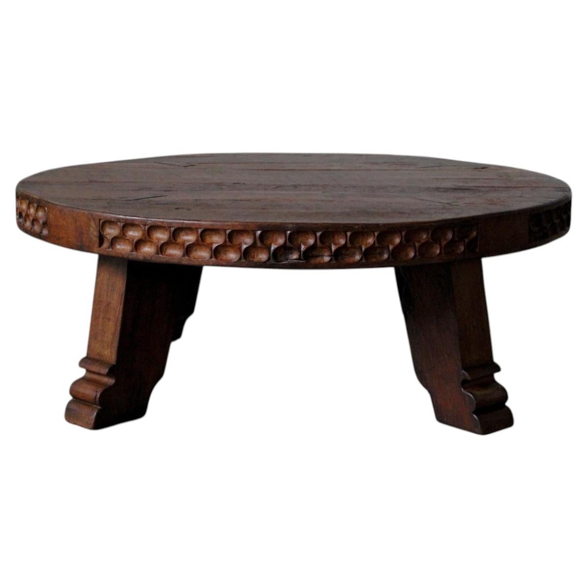 Carved rustic oak round coffee table - Netherlands 1950s