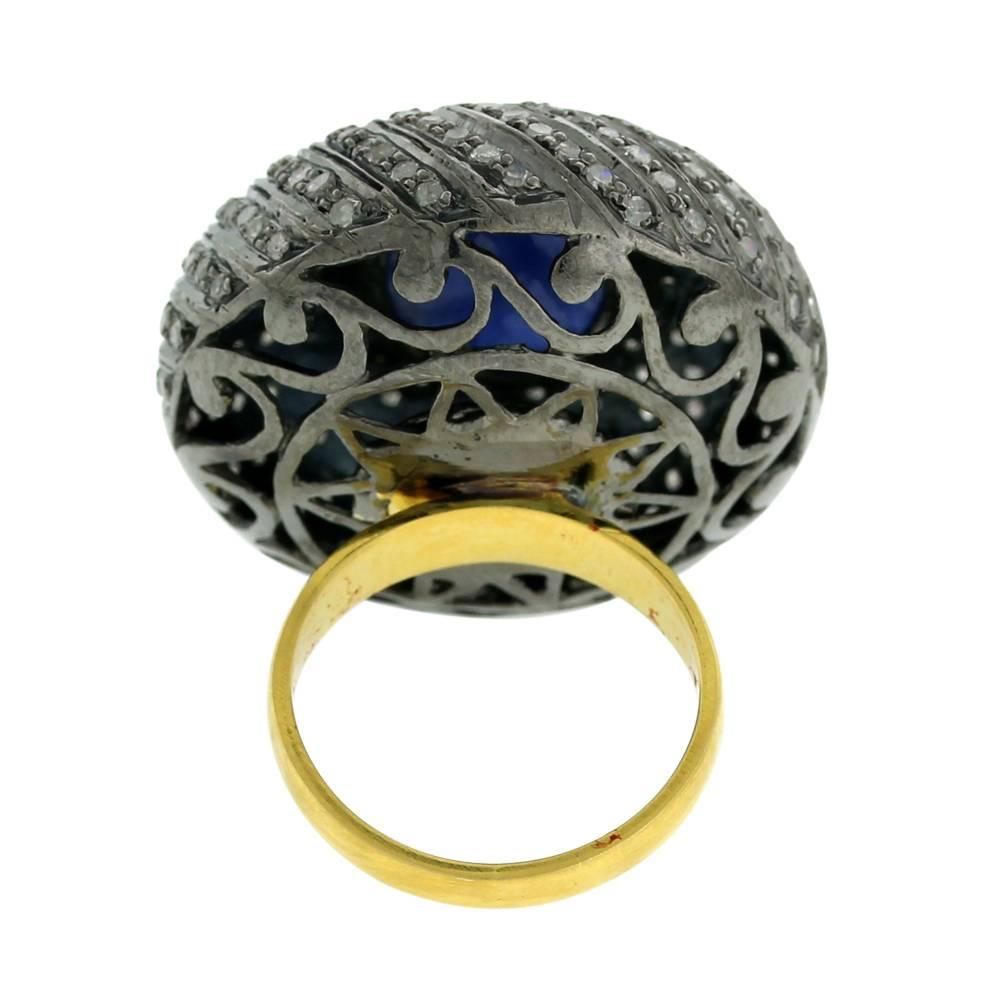 Modern Carved Sapphire Ring with Diamonds Around in Dome Shape Made In 18k Gold For Sale