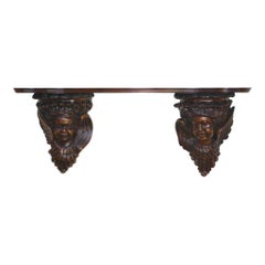 Carved Shelf with Cherub Faces