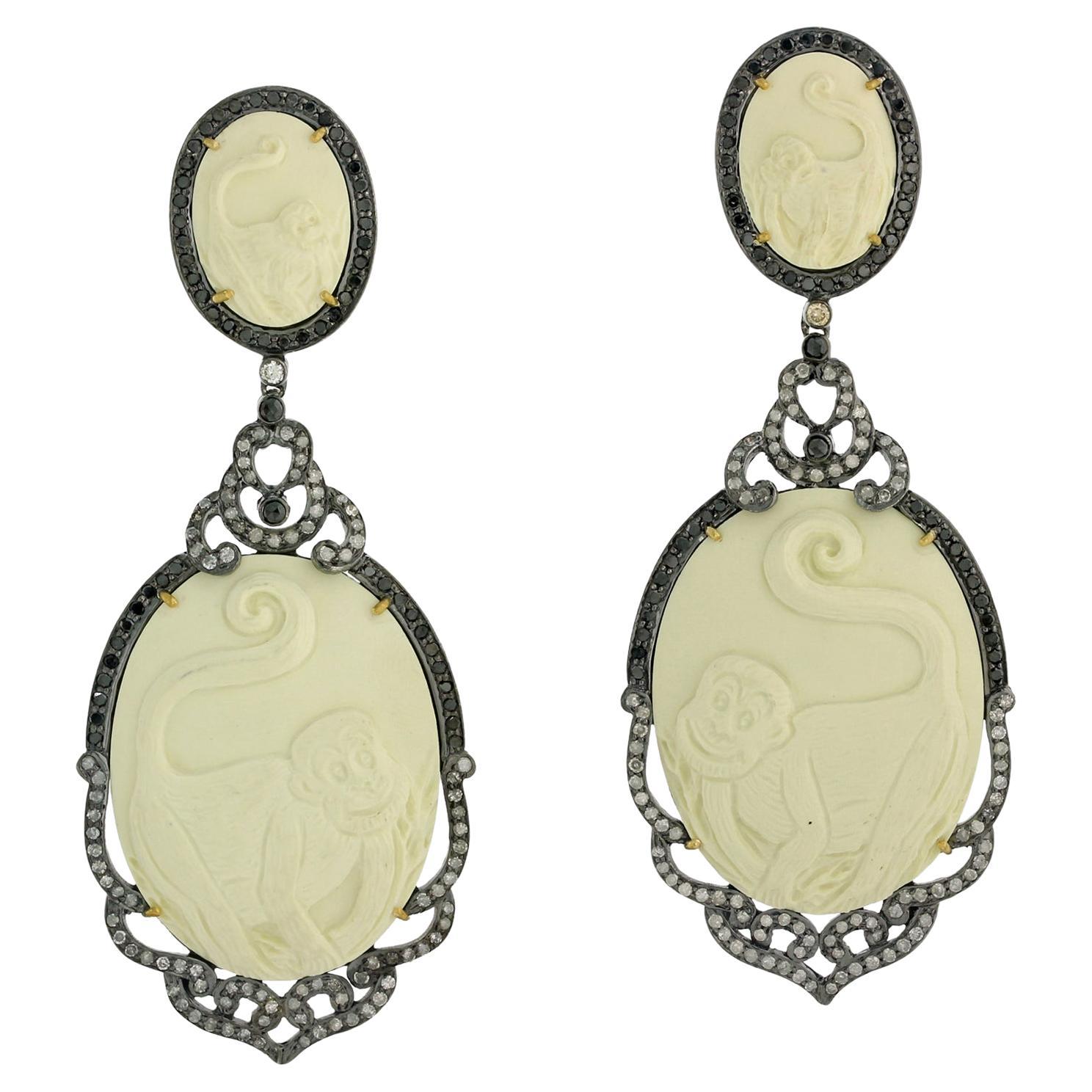 Carved Shell Cameo Earrings Surrounded by Pave Diamonds in 18k Gold & Silver For Sale