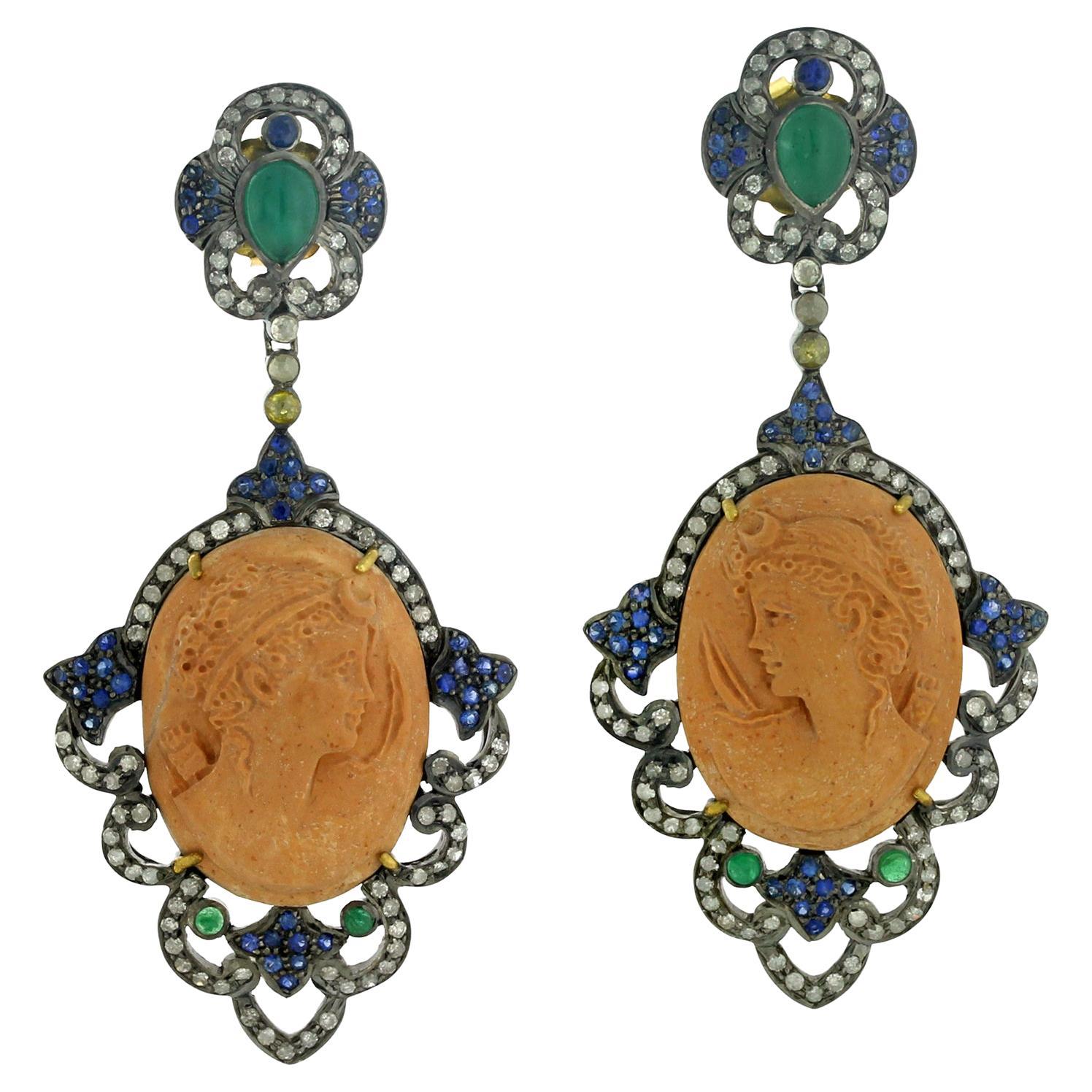 Carved Shell Cameo Earrings With Emeralds Surrounded By Pave Sapphire & Diamonds For Sale