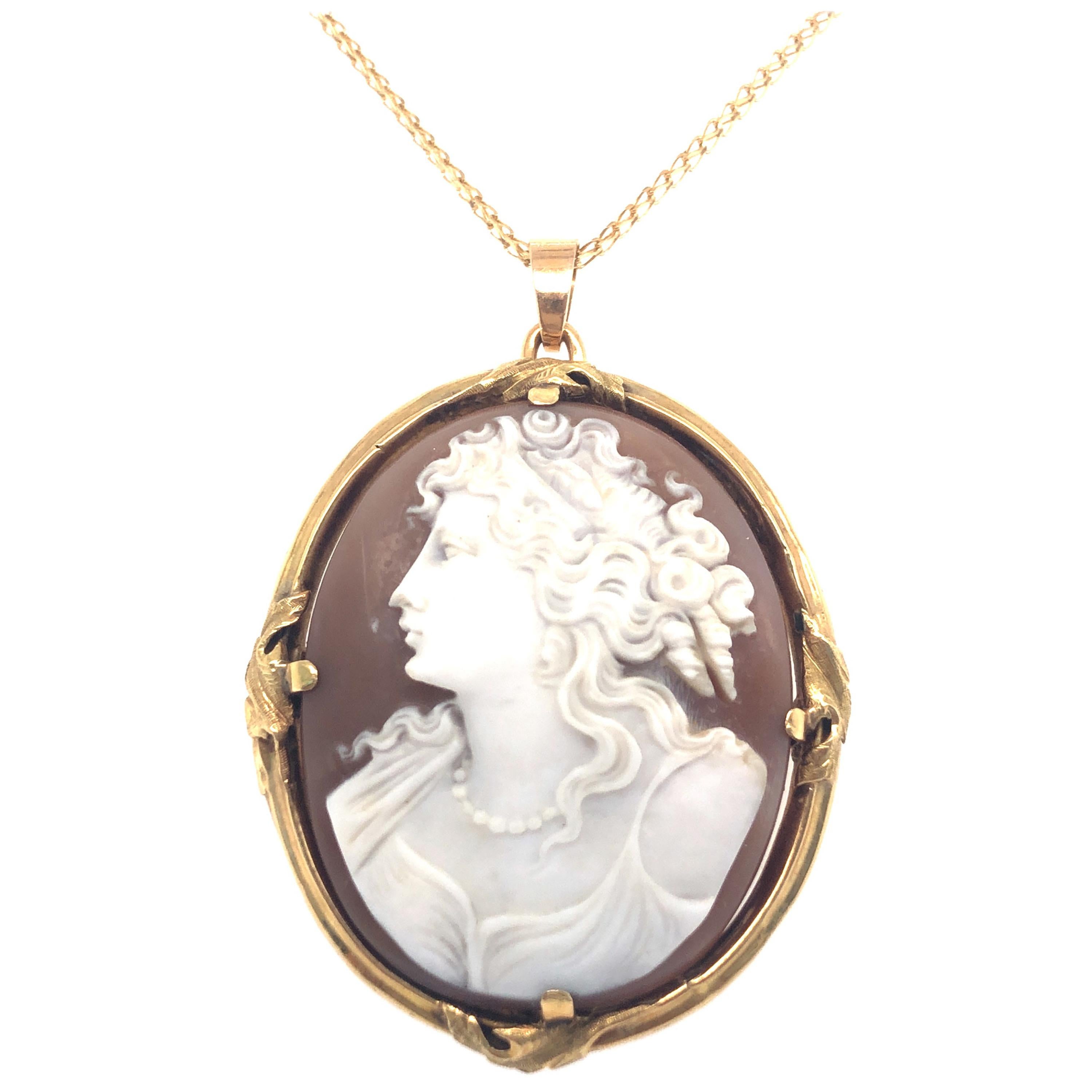 Carved Shell Cameo Pendant with Frame in 18 Karat Yellow Gold