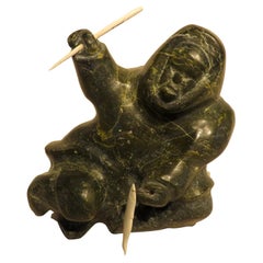 Vintage Carved Soapstone Sculpture of a Seated Inuit Holding a Bone Narwhal Tusk & Fish