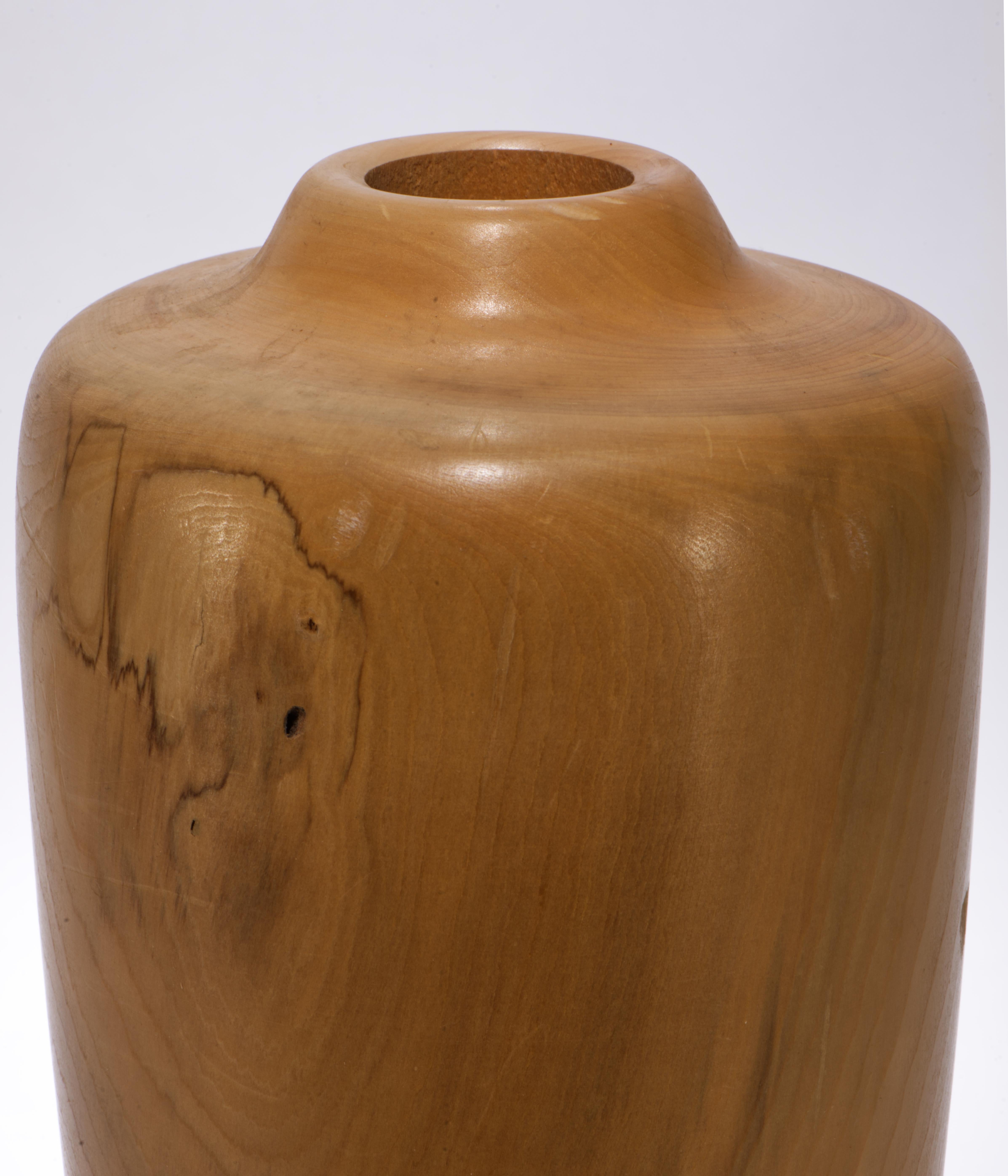 Vintage large decorative vase features handcrafted sculptural urn shape, carved of solid Maple wood. The fine wood texture is emphasized by the subtle color variations within the wood grain, and the semi-matte tung oil and wax finish. The color