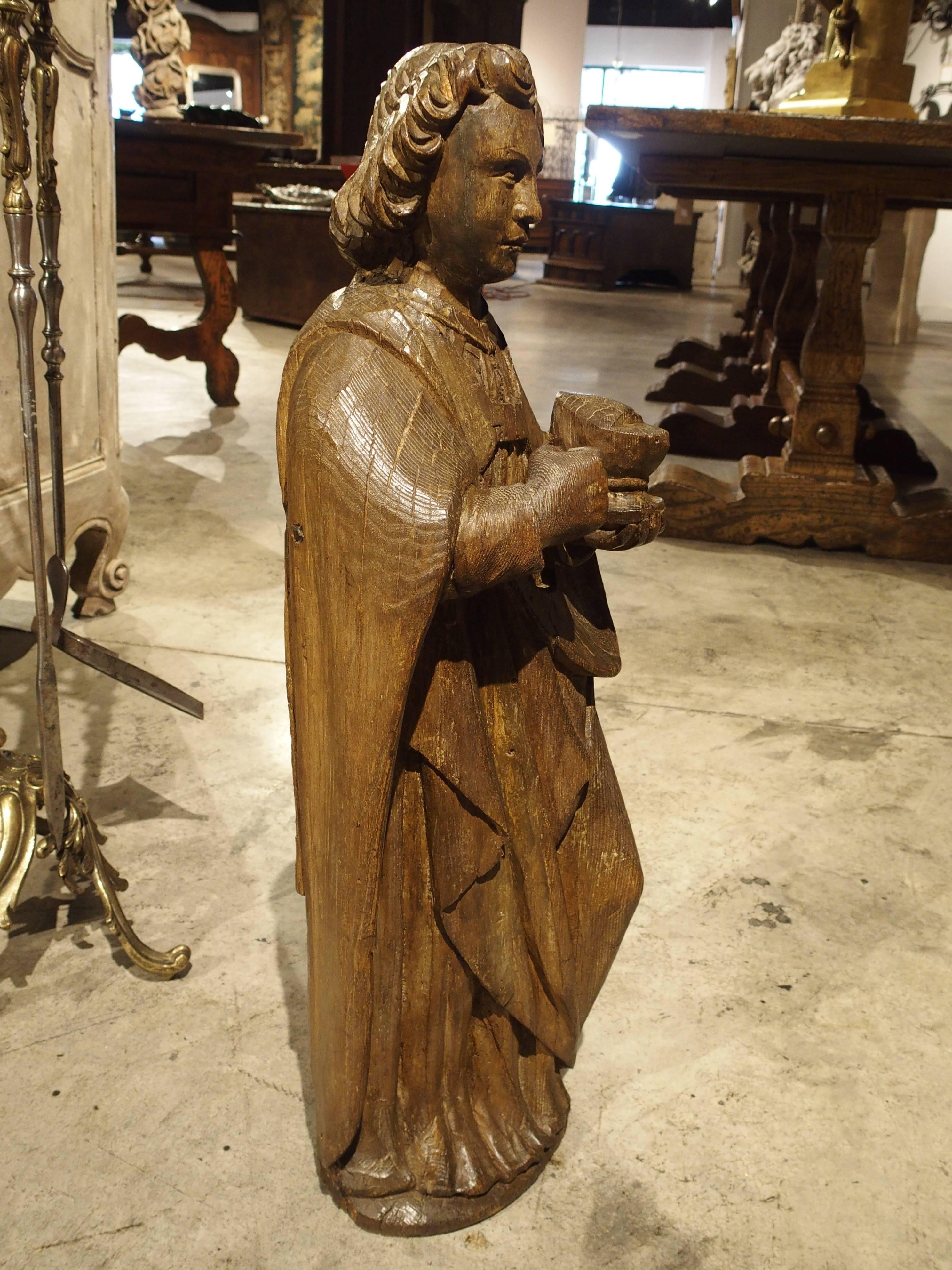 Carved Solid Oak Statue of St John the Evangelist, circa 1600 1