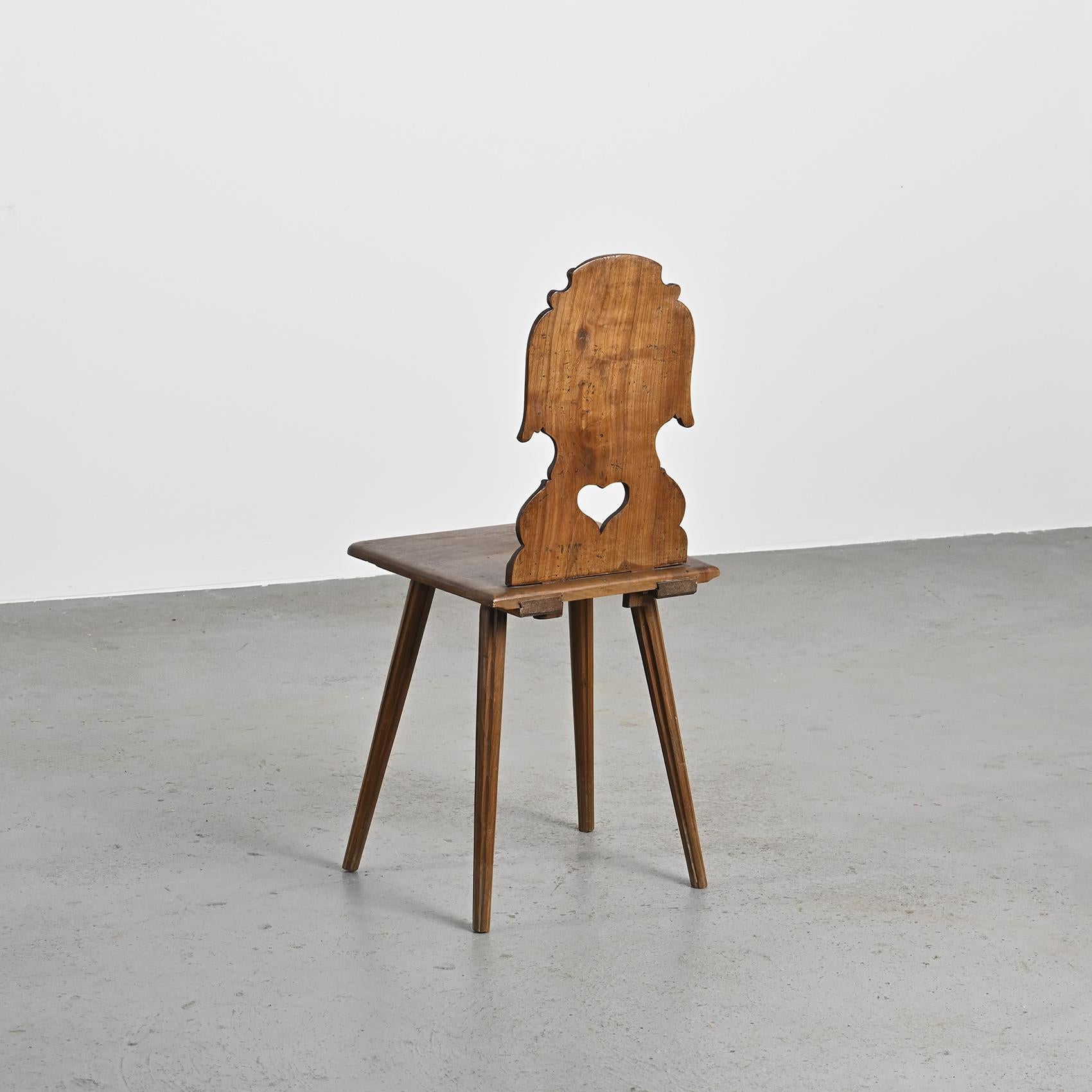 Carved solid wood escabelle, Swiss Alps, circa 1950 For Sale 1