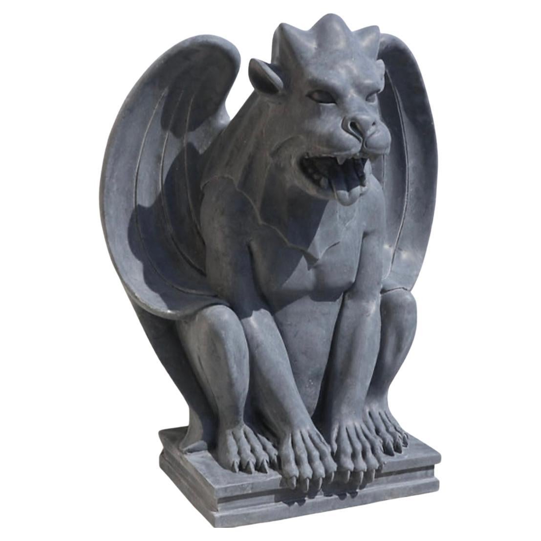 Carved Stone Grotesque Gargoyles are intricately sculpted figures, traditionally used in Gothic architecture to serve both decorative and functional purposes. These fantastical stone creatures, often depicted with exaggerated, monstrous features
