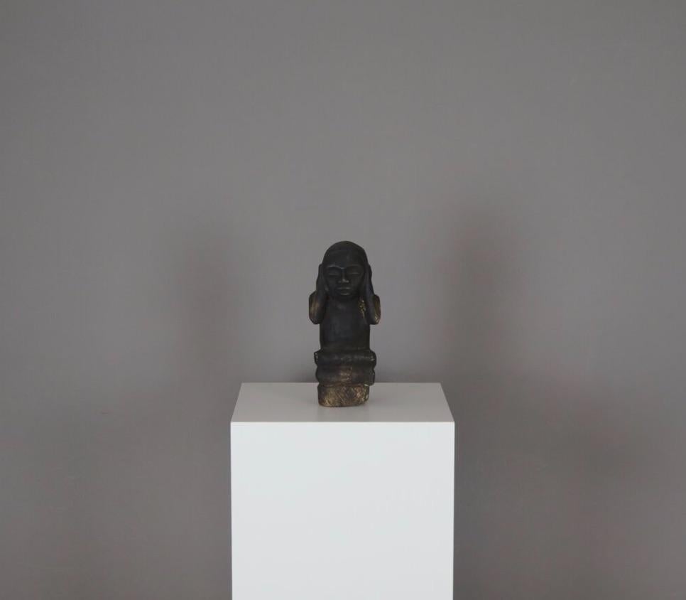 Tribal Carved-Stone ‘Hear No Evil’ Sculpture. Republic of Congo, circa late 19th Century.