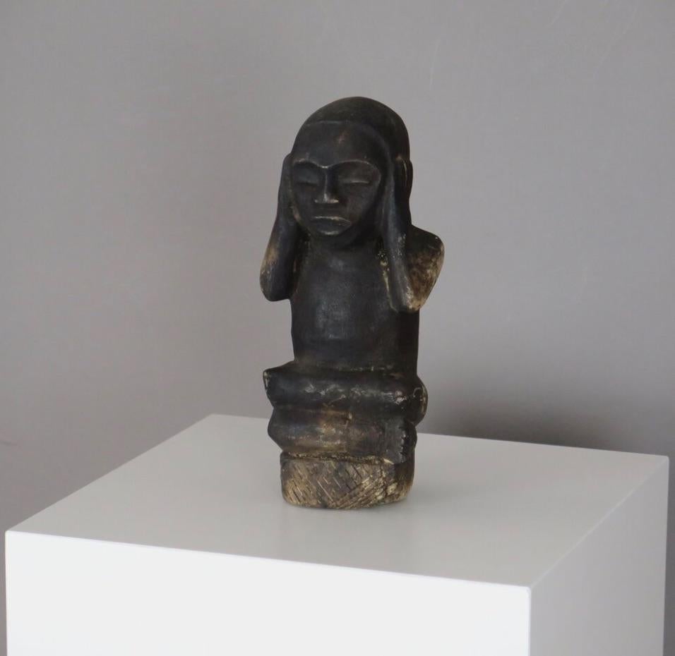 Sculpté à la main Sculpture « Hear No Evil » en pierre sculptée en vente