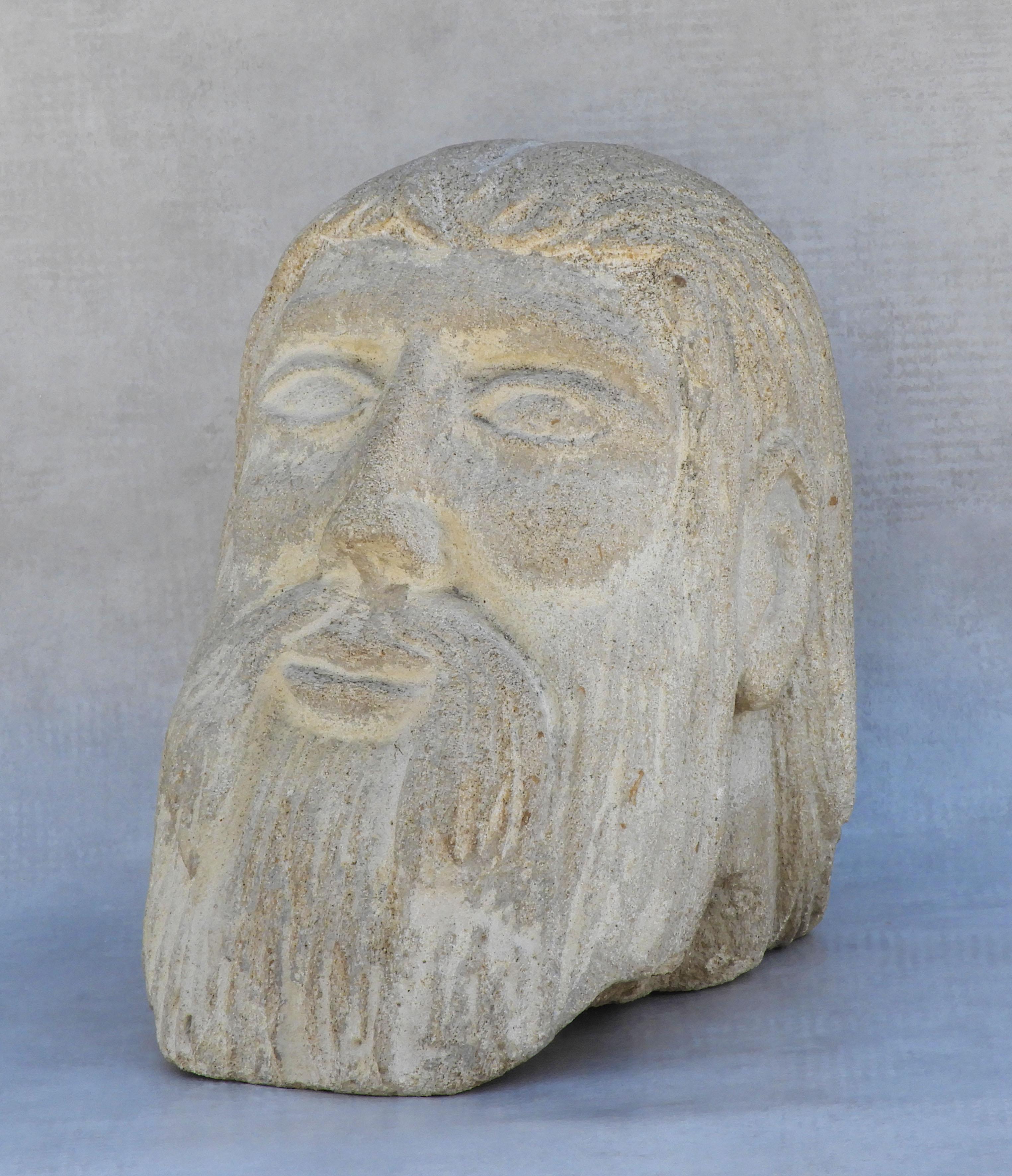 Carved stone male head sculpture 20th century Europe.

A life-size stone-carved head sculpture of a bearded man by an unknown artist.

Well executed with nice detailing and a good patina.

Great decorative piece.