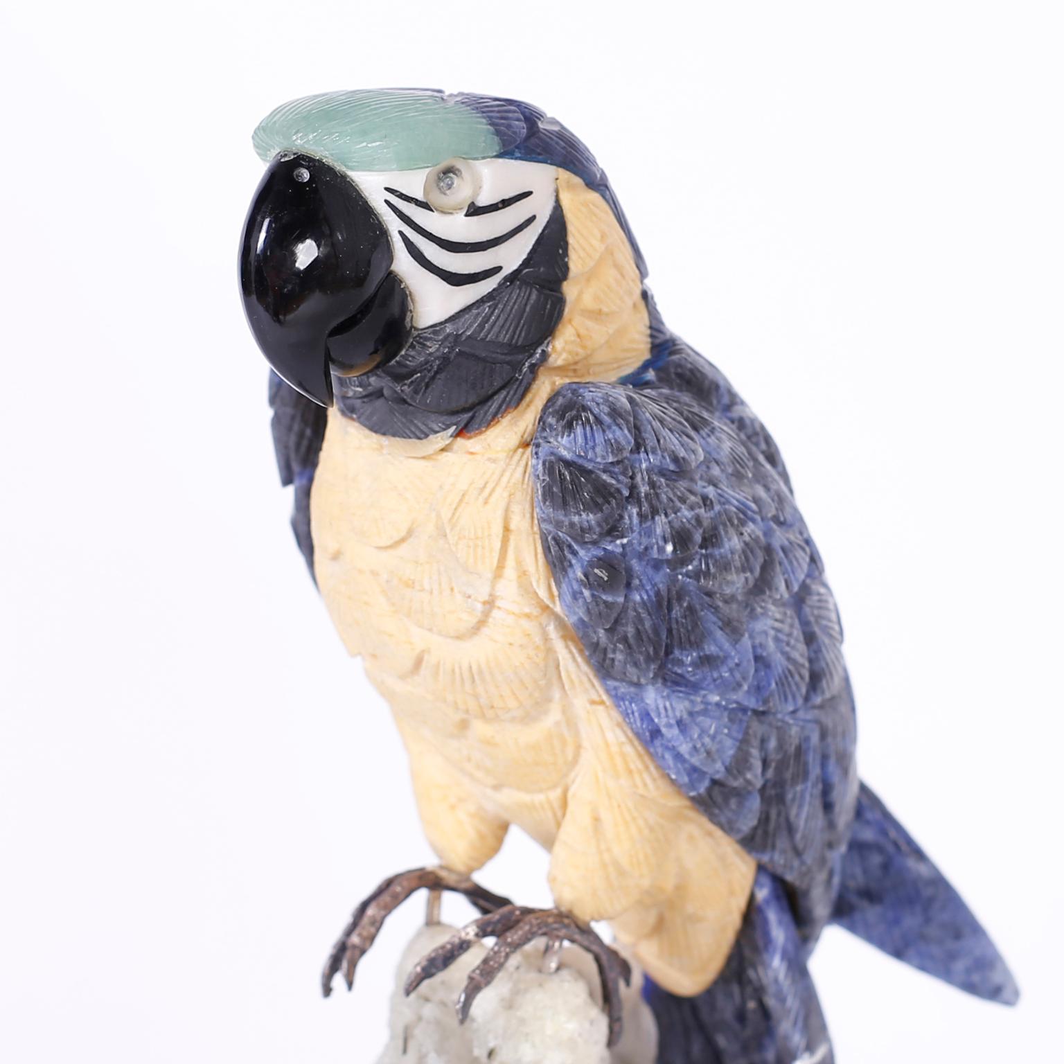 Brazilian parrot carved from semi precious stones perched on a quartz geode and presented on a lucite base.