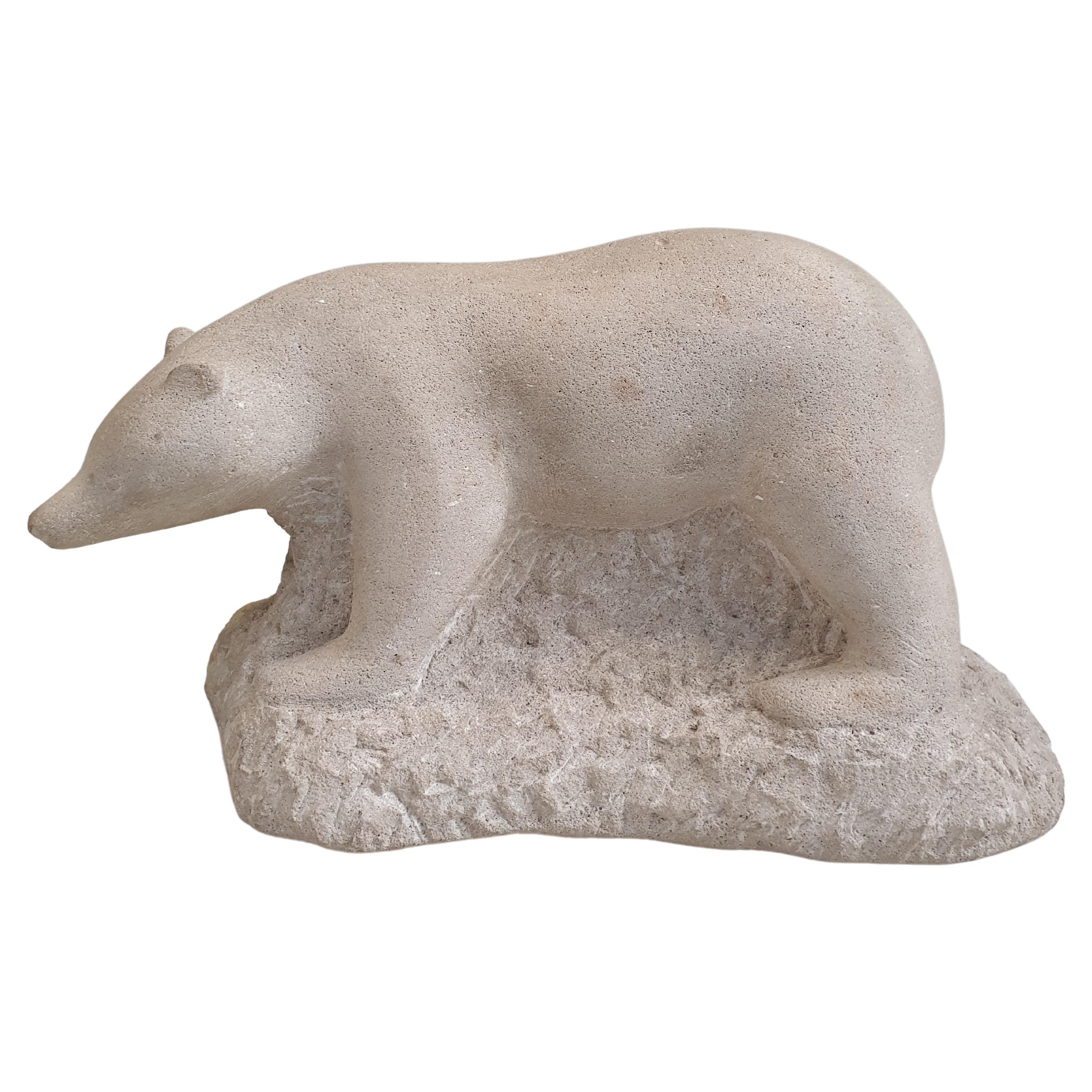 Carved stone sculpture of a polar bear, signed. For Sale