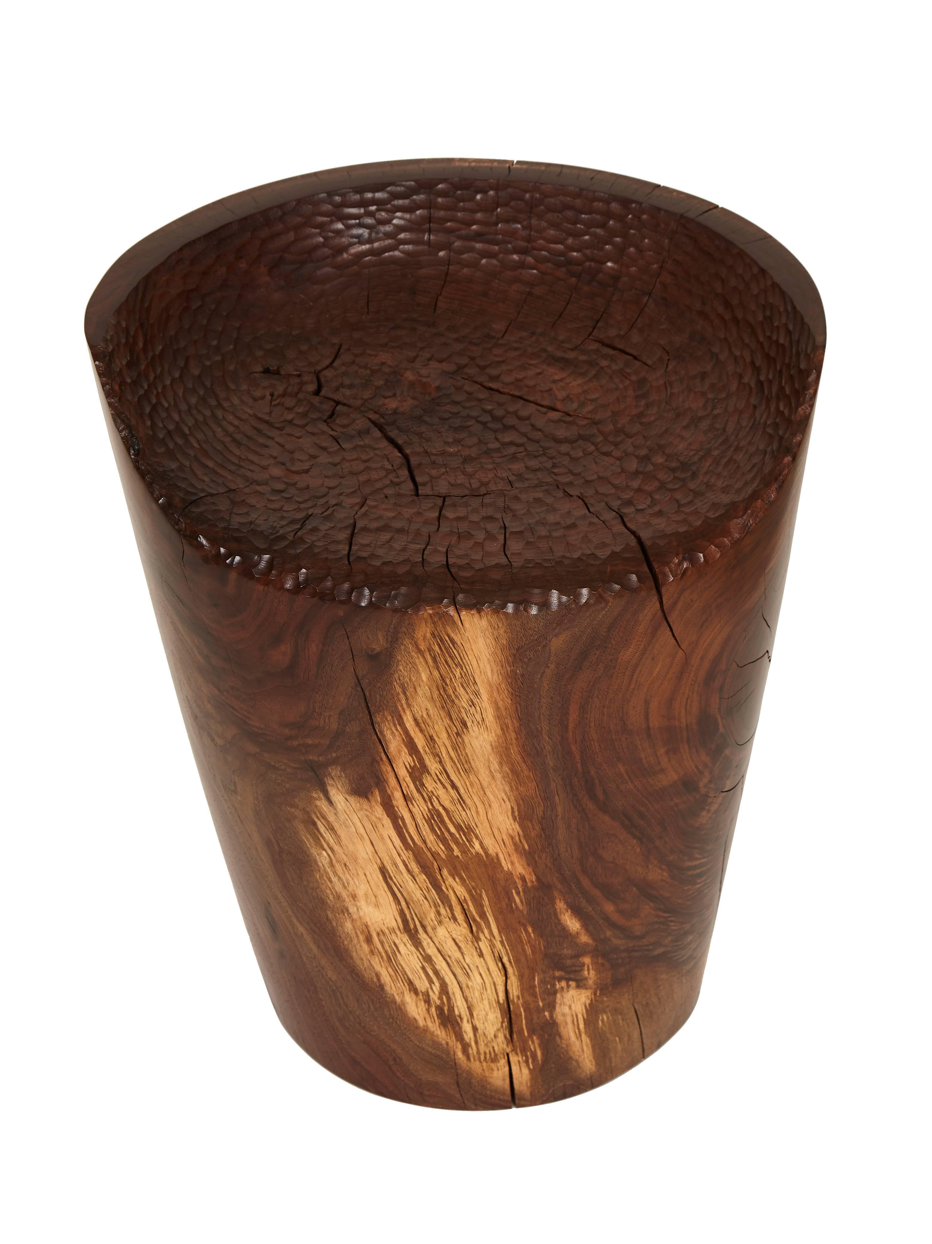 Carved walnut stool by Caleb Woodard from solid walnut, circa 2017. Hand-carved highly sculpted organic form kiln dried to control splitting over time finished with a white oil hand rubbed finish. Caleb Woodard is a designer and second-generation