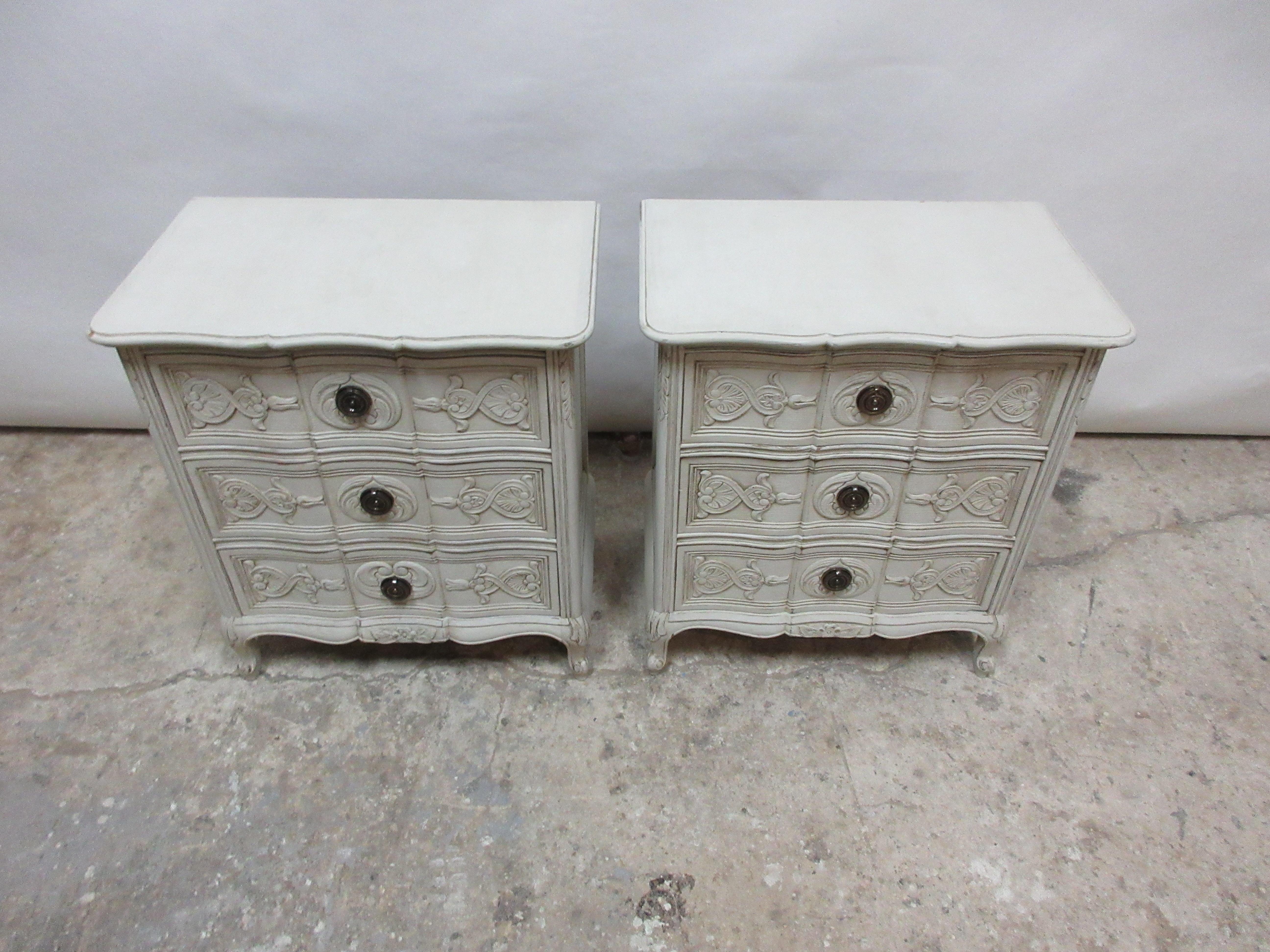 This is a set of 2 carved swedish Rococo style nightstands. They have been restored and repainted with milk paints 