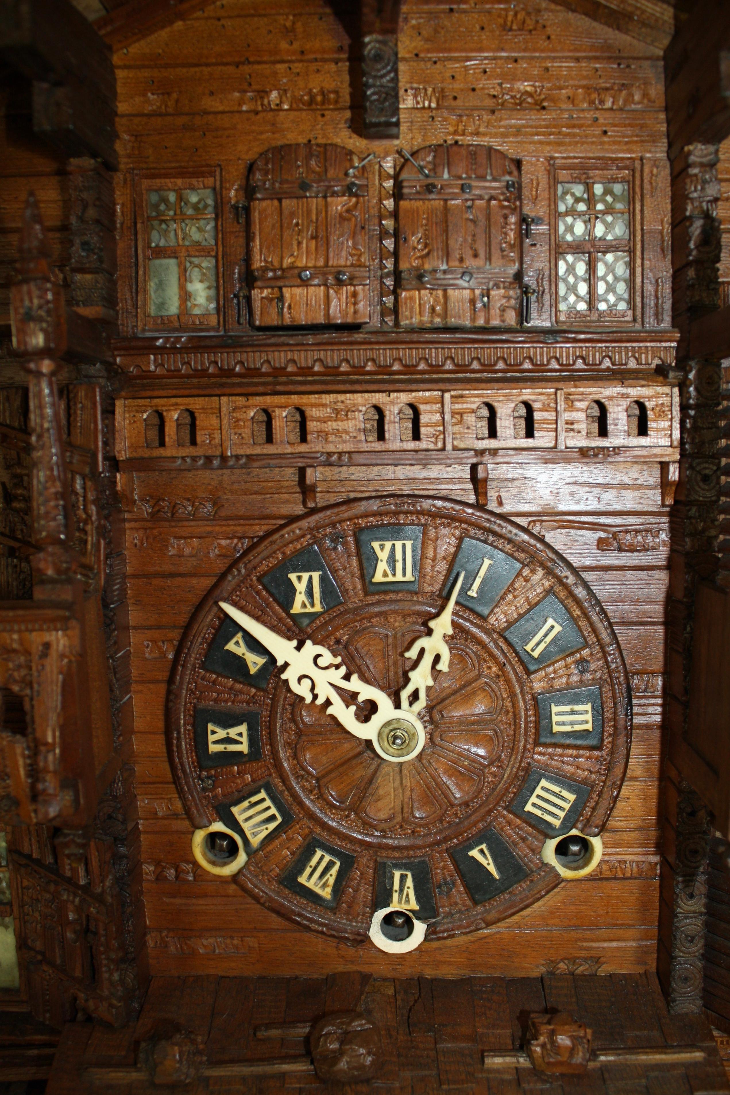 Late 19th Century Carved Swiss Black Forest Chalet Clock, circa 1880 For Sale