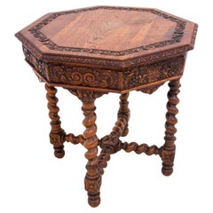 Carved table, France, circa 1910.