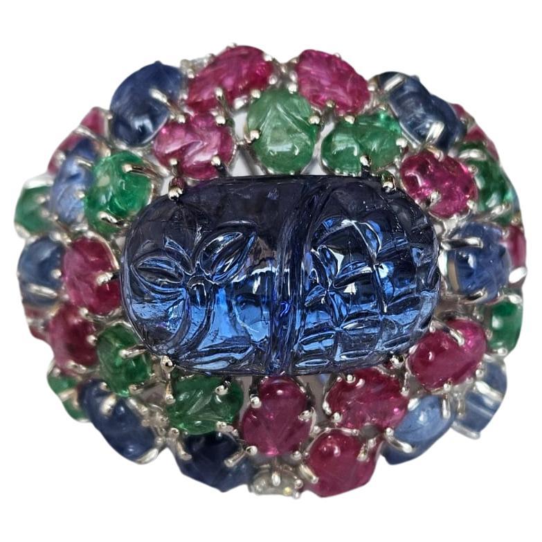 Carved Tanzanite, Blue Sapphire, Emerald, Ruby & Dia Tutti Frutti Cocktail Ring For Sale